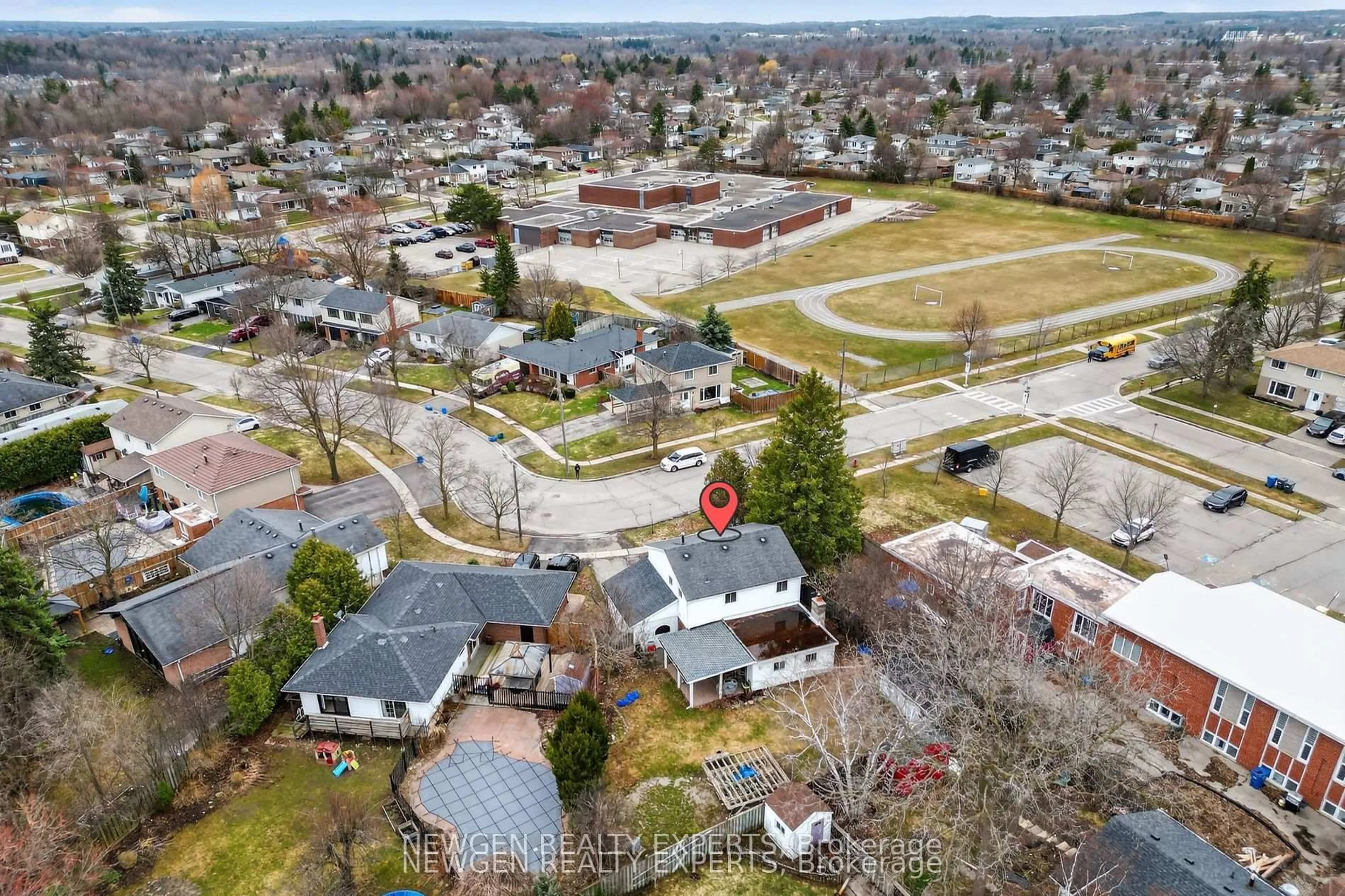 A pic from outside/outdoor area/front of a property/back of a property/a pic from drone, street for 63 FALUDON Dr, Halton Hills Ontario L7G 1H9