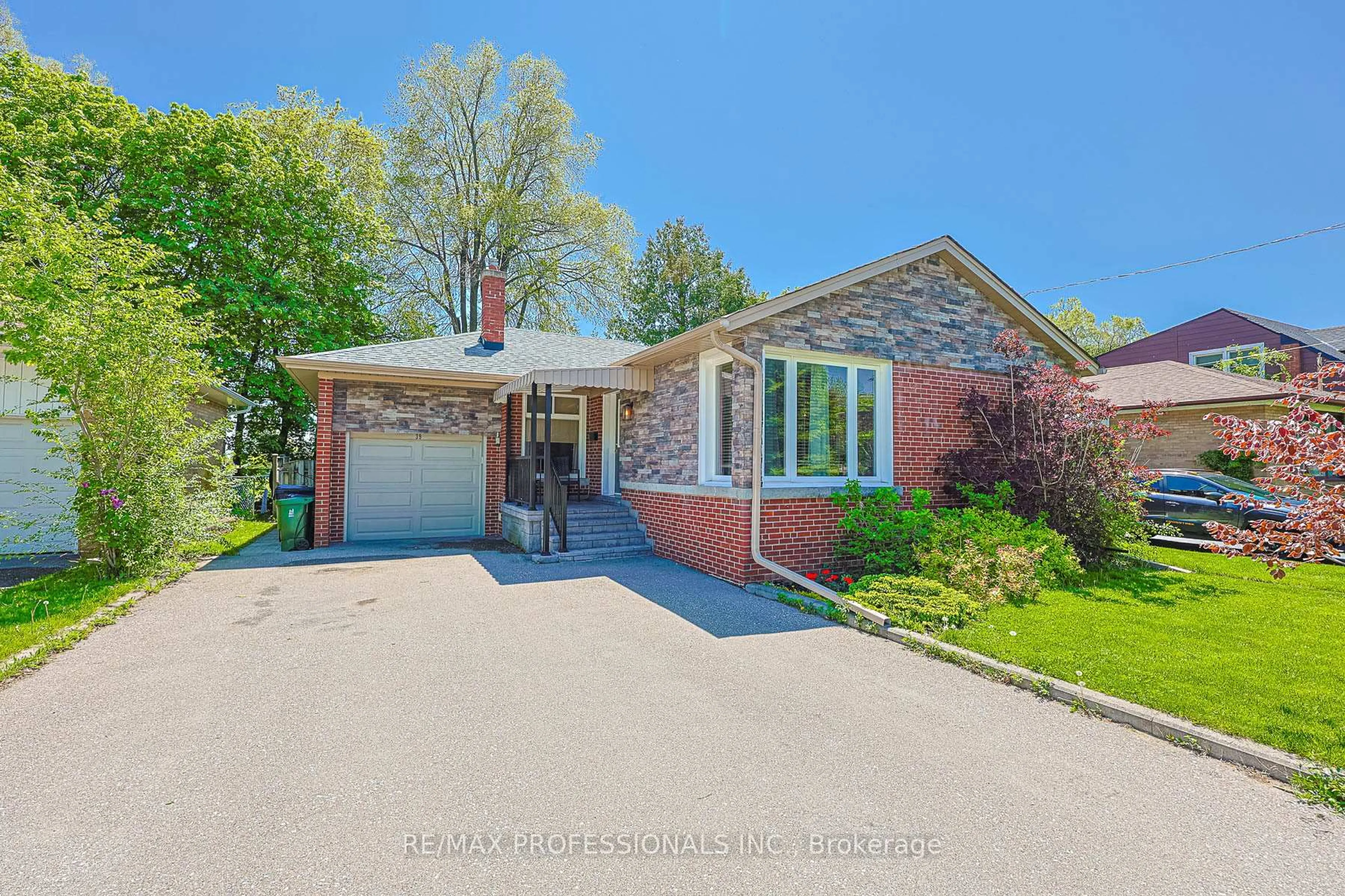 Home with brick exterior material, street for 39 Sealcove Dr, Toronto Ontario M9C 2C7