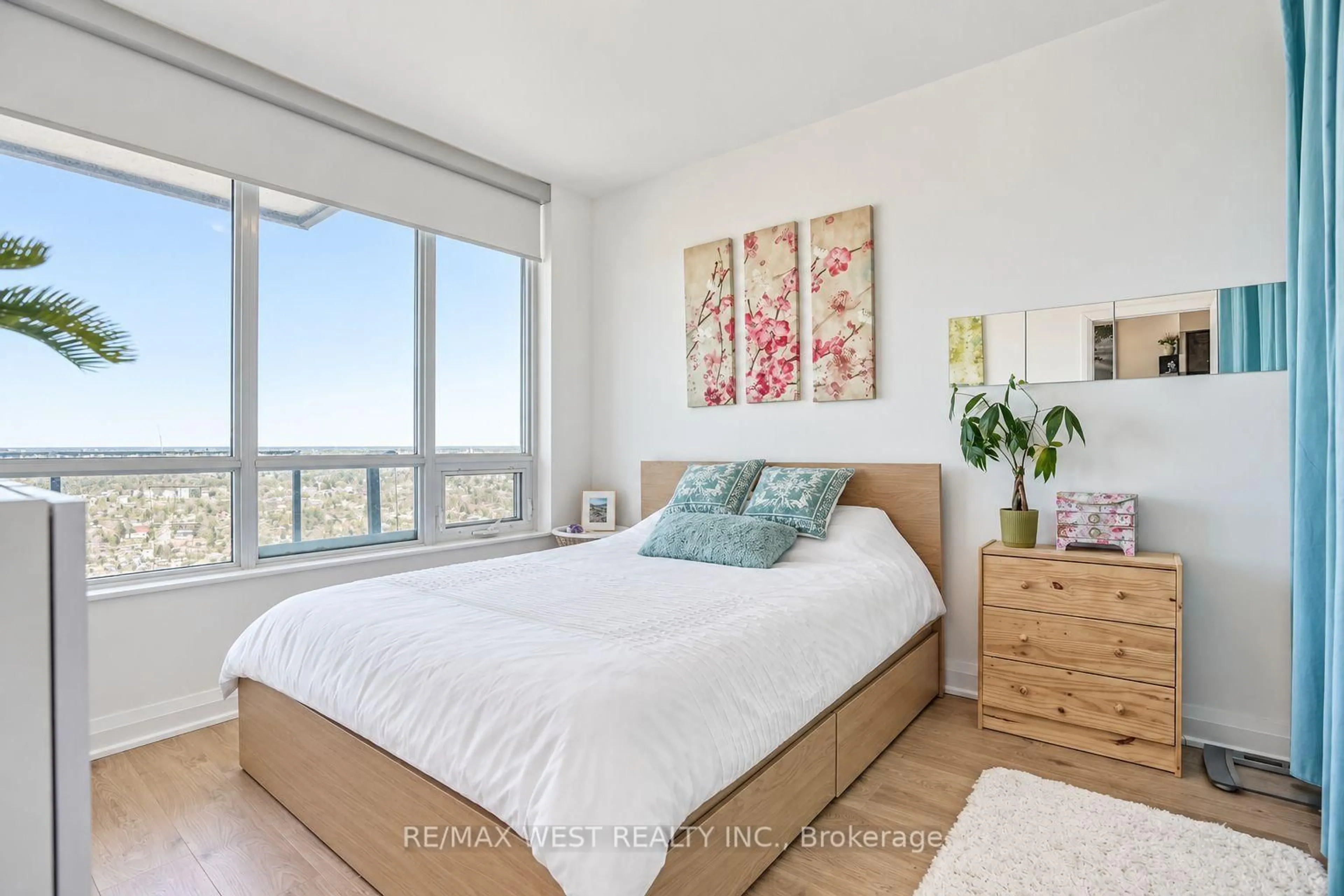 Bedroom with bed, wood/laminate floor for 36 Park Lawn Rd #2107, Toronto Ontario M8V 0E5