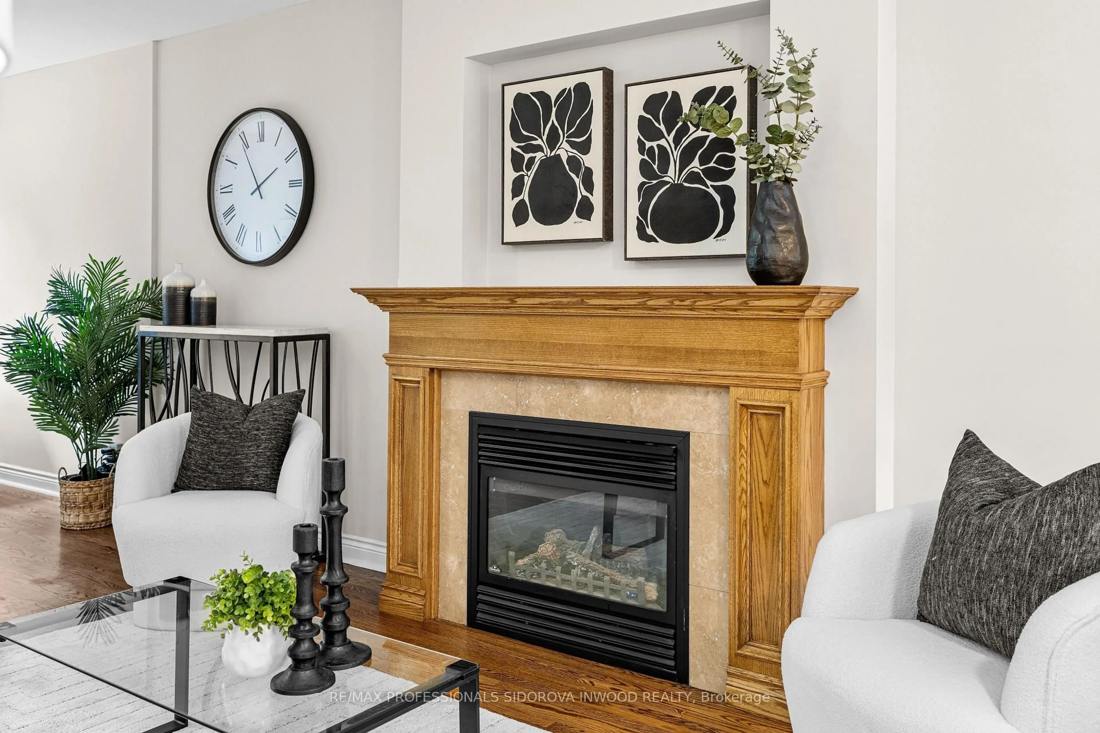 Living room with furniture, wood/laminate floor for 19 Harshaw Ave, Toronto Ontario M6S 1X9