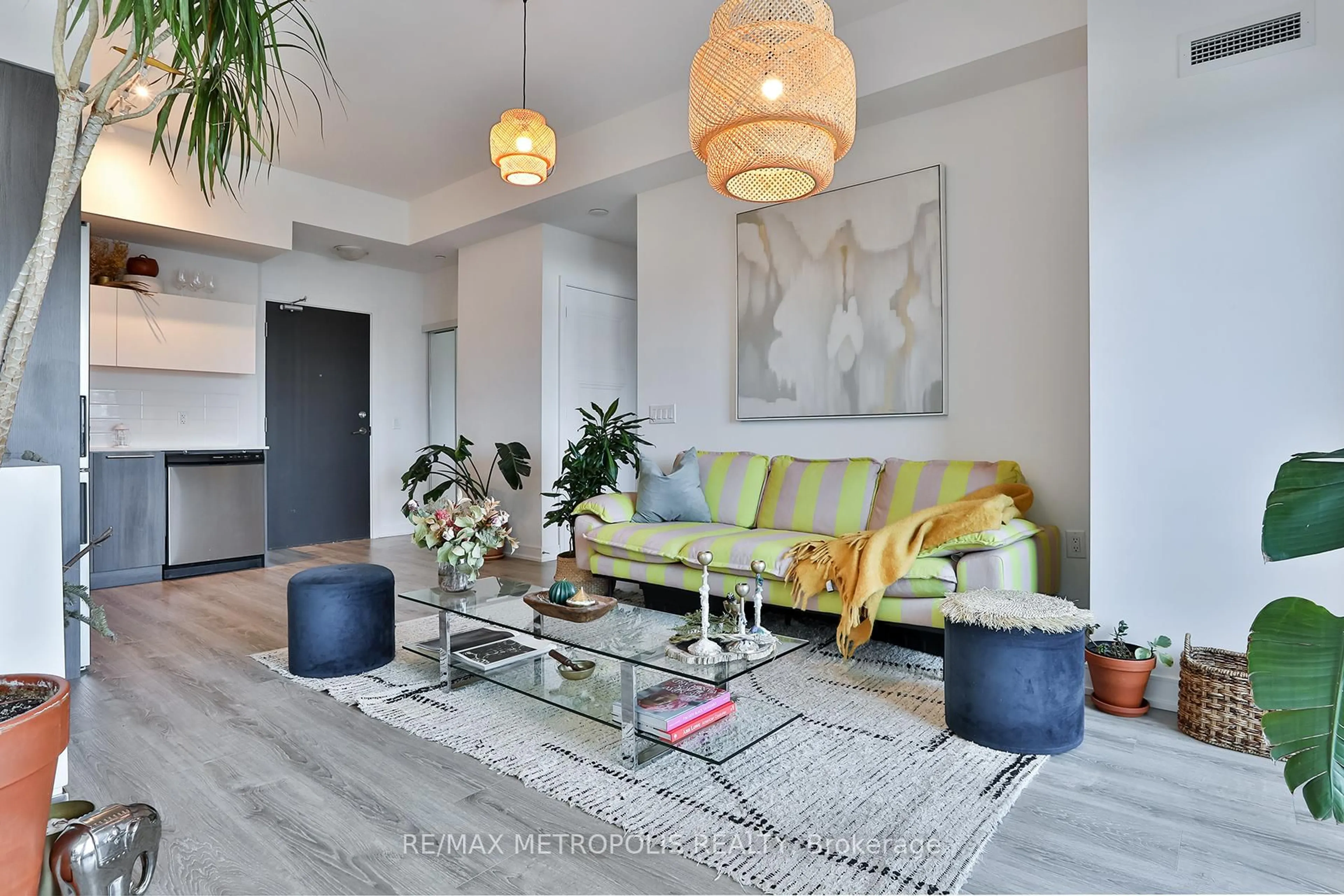 Living room with furniture, unknown for 25 Neighbourhood Lane #703, Toronto Ontario M8Y 0C4
