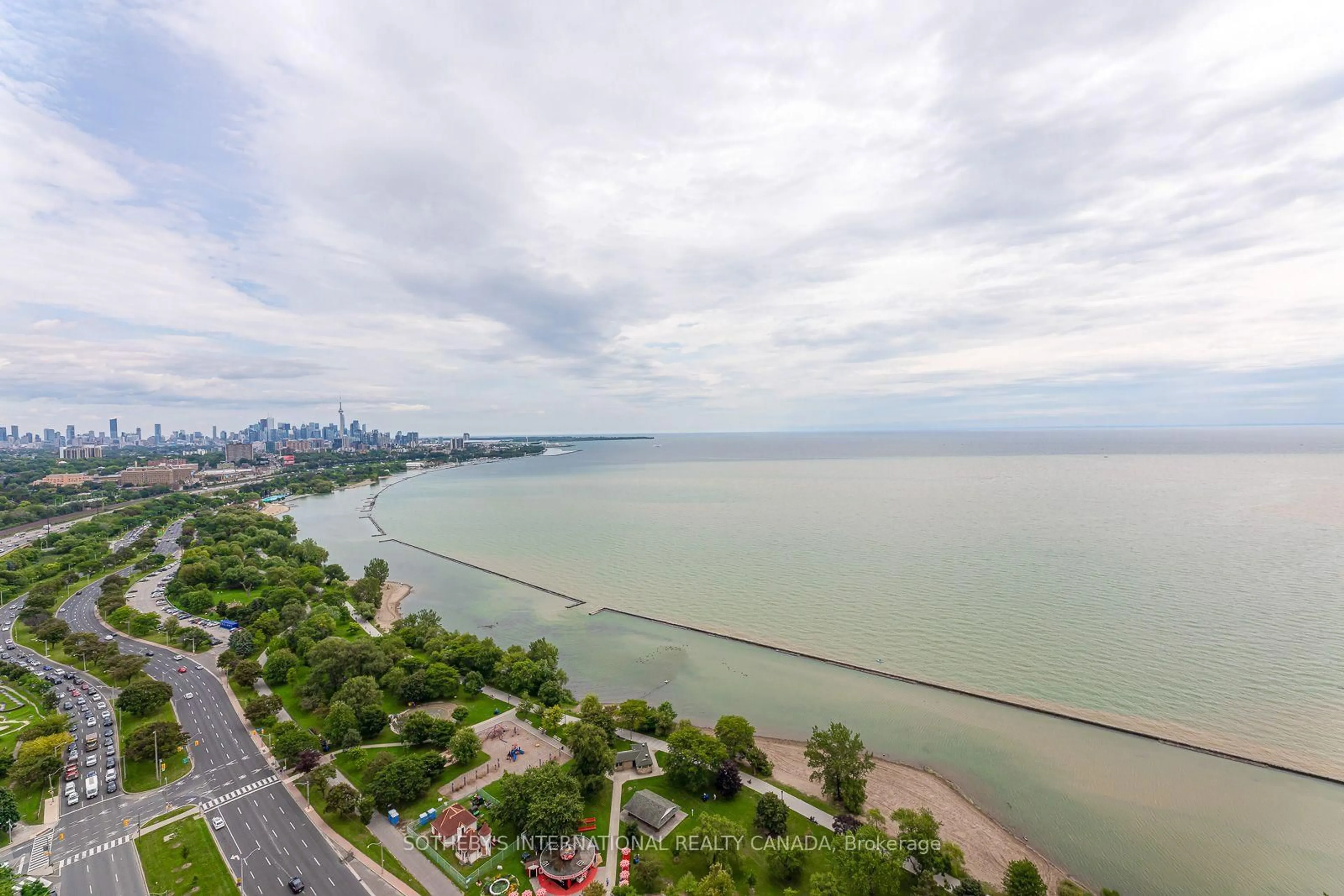 A pic from outside/outdoor area/front of a property/back of a property/a pic from drone, water/lake/river/ocean view for 1928 Lake Shore Blvd #3906, Toronto Ontario M6S 0B1