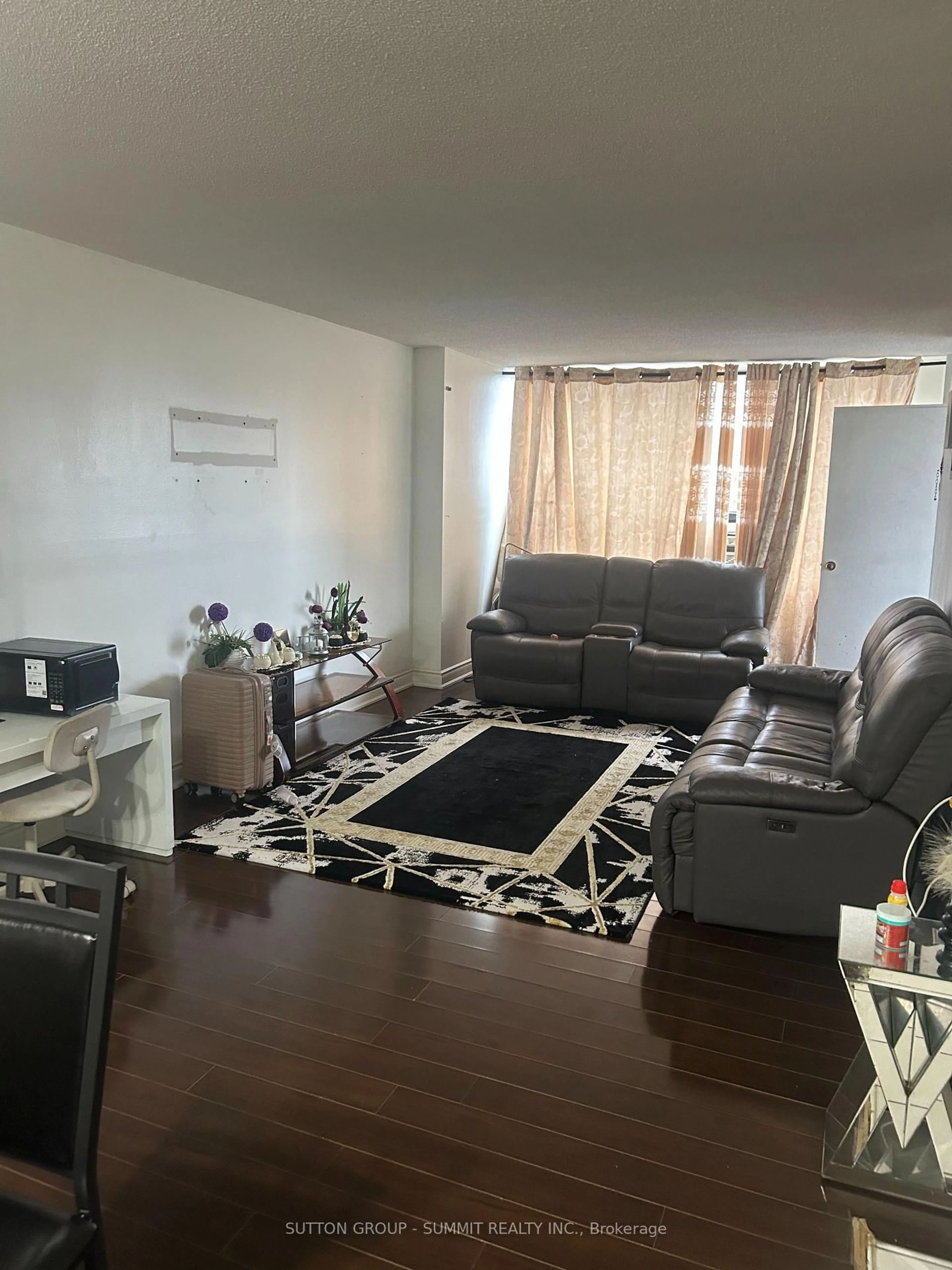 Living room with furniture, unknown for 320 Dixon Rd #1111, Toronto Ontario M9R 1S8