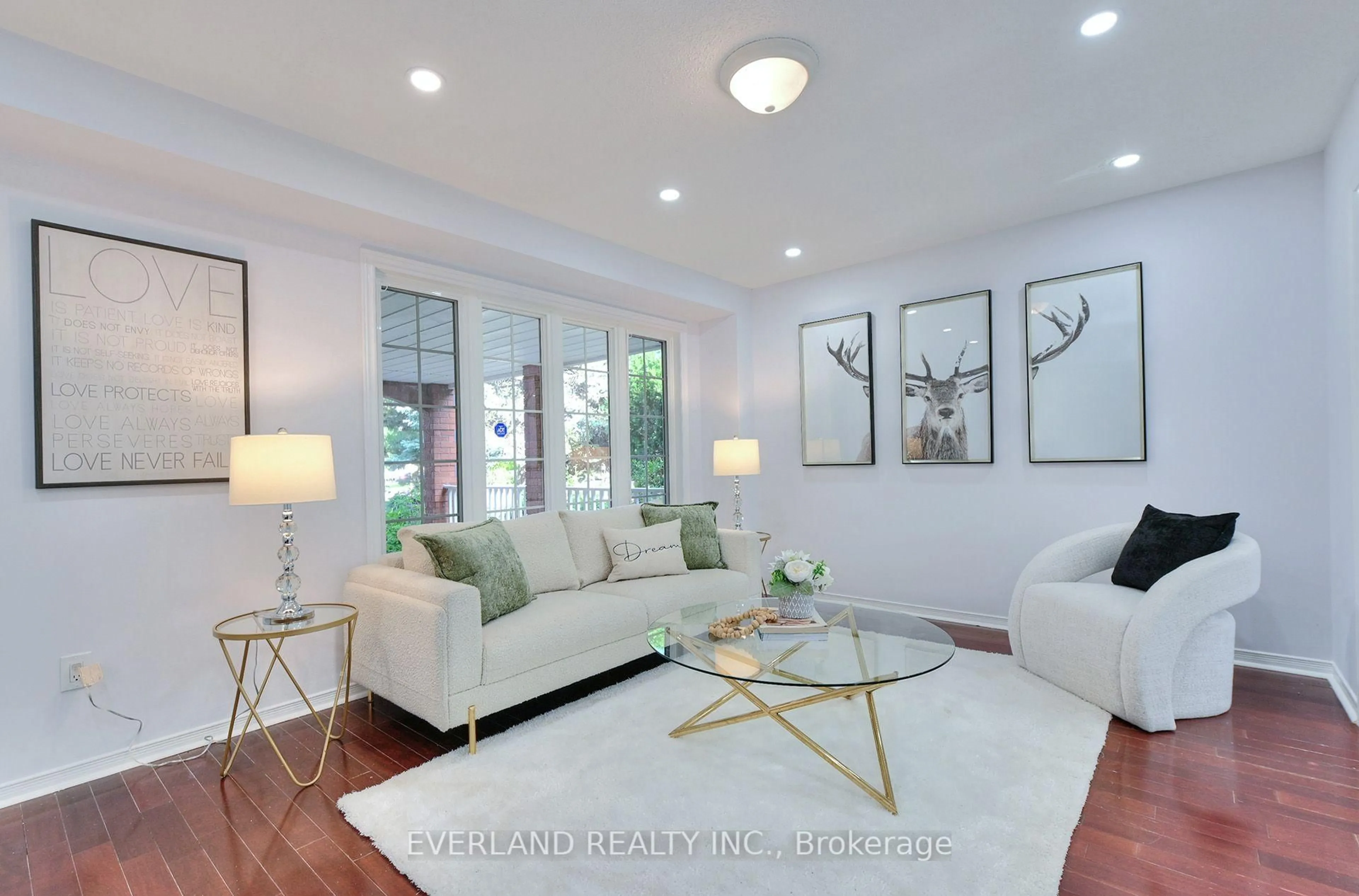 Living room with furniture, wood/laminate floor for 5386 Middlebury Dr, Mississauga Ontario L5M 5E6
