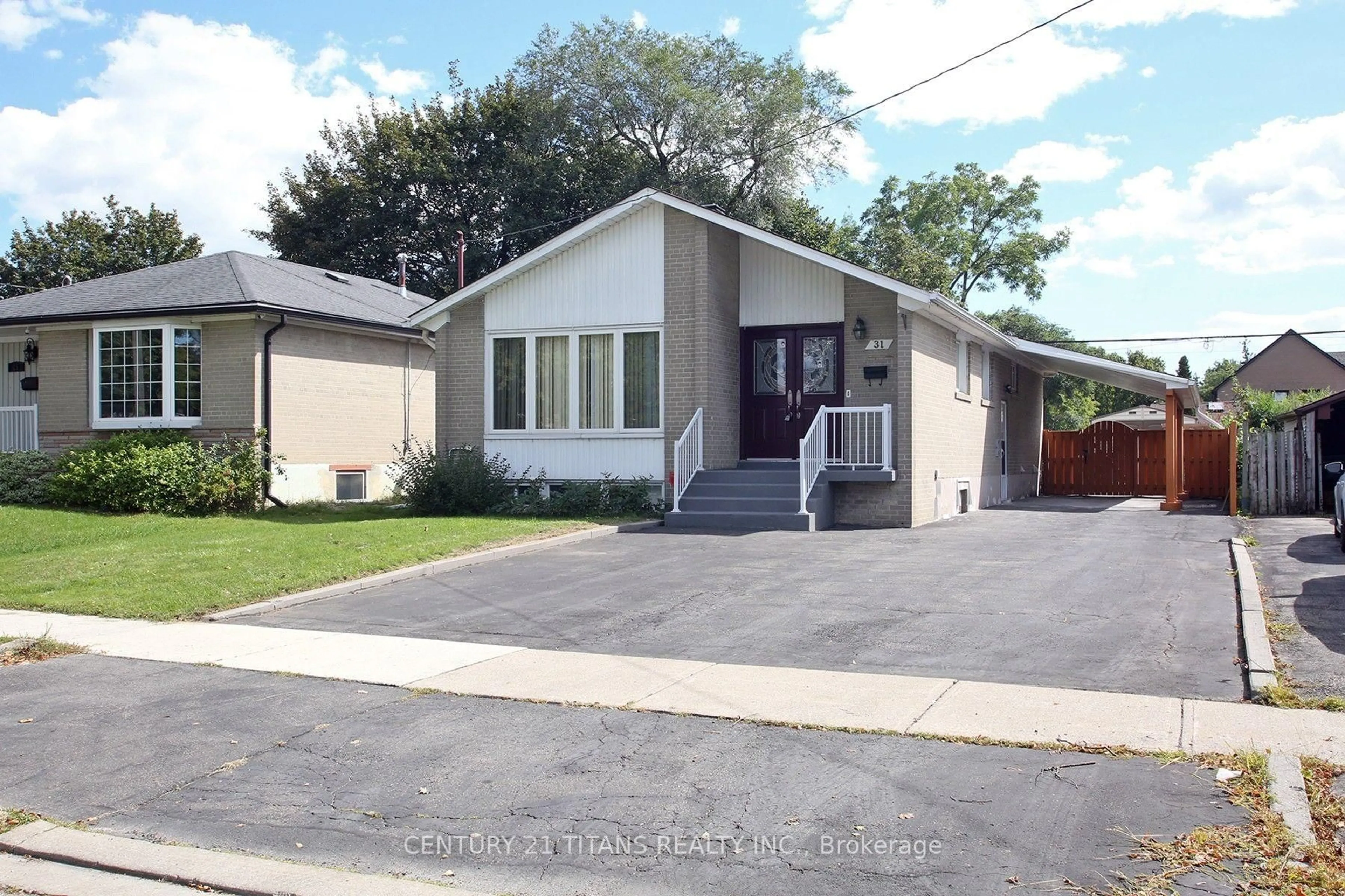Home with vinyl exterior material, street for 31 Monterrey Dr, Toronto Ontario M9V 1S7