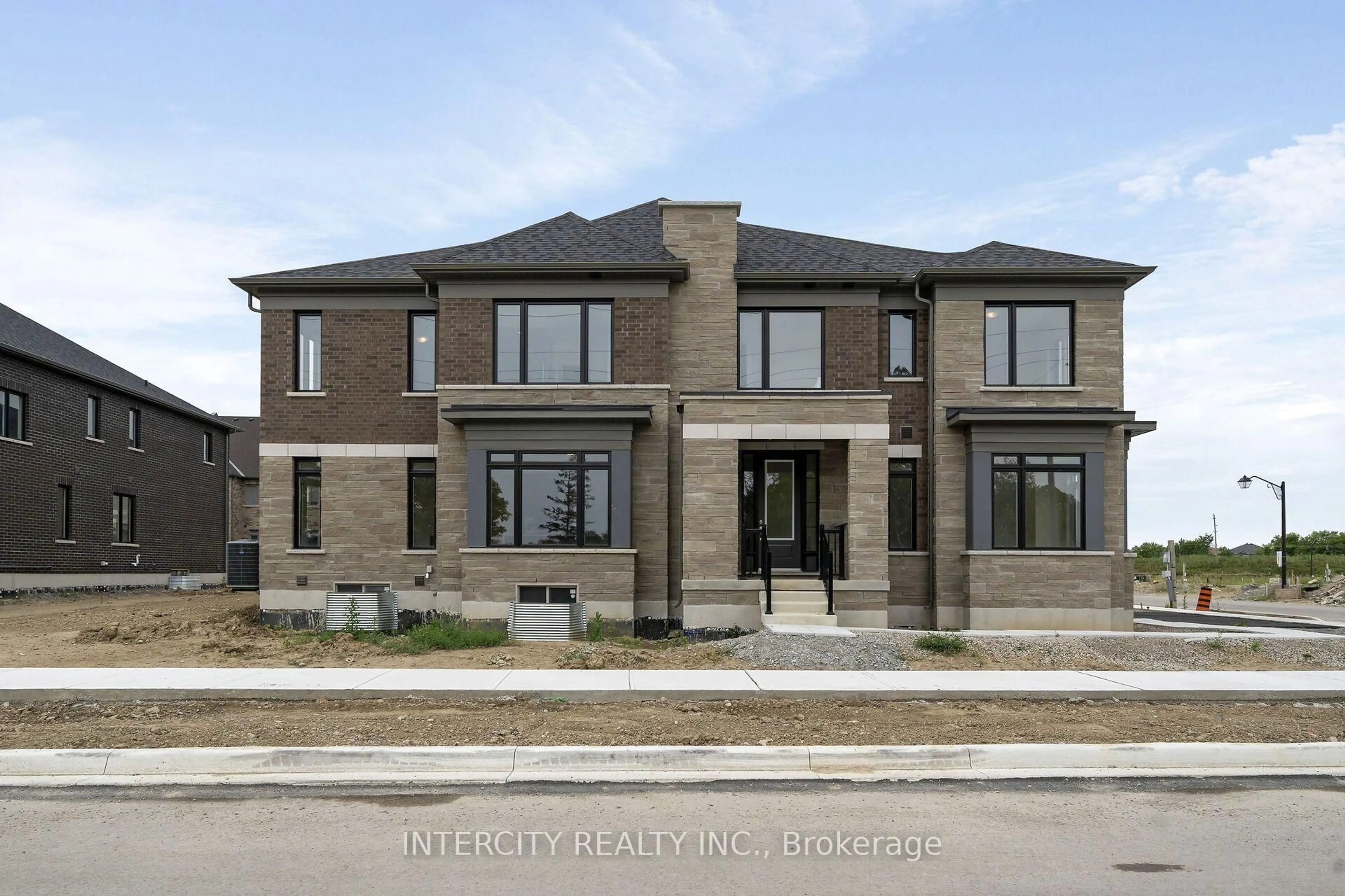 Home with brick exterior material, street for 13969 Chickadee Lane #20-104, Caledon Ontario L7E 4N1