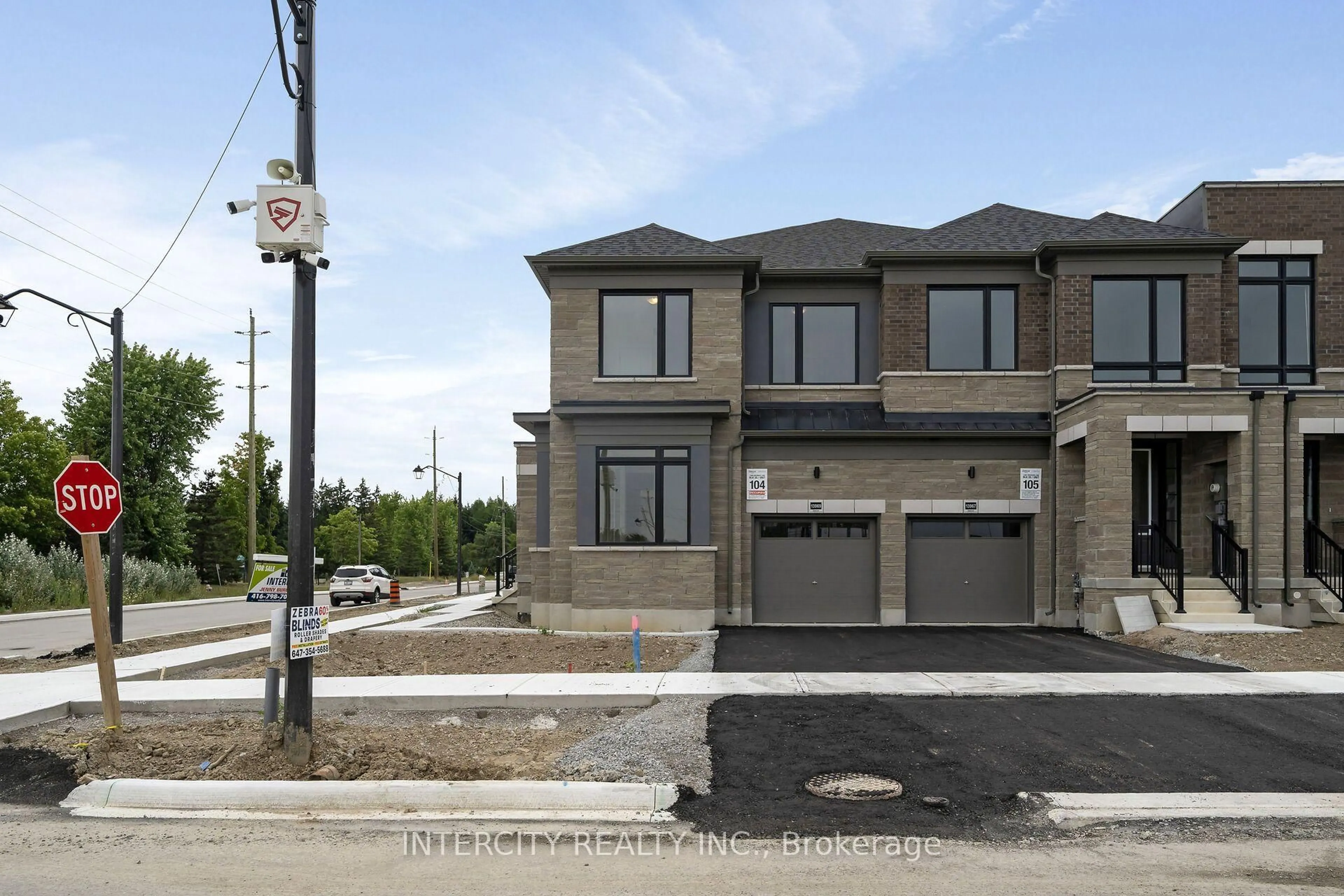 Home with brick exterior material, street for 13969 Chickadee Lane #20-104, Caledon Ontario L7E 4N1