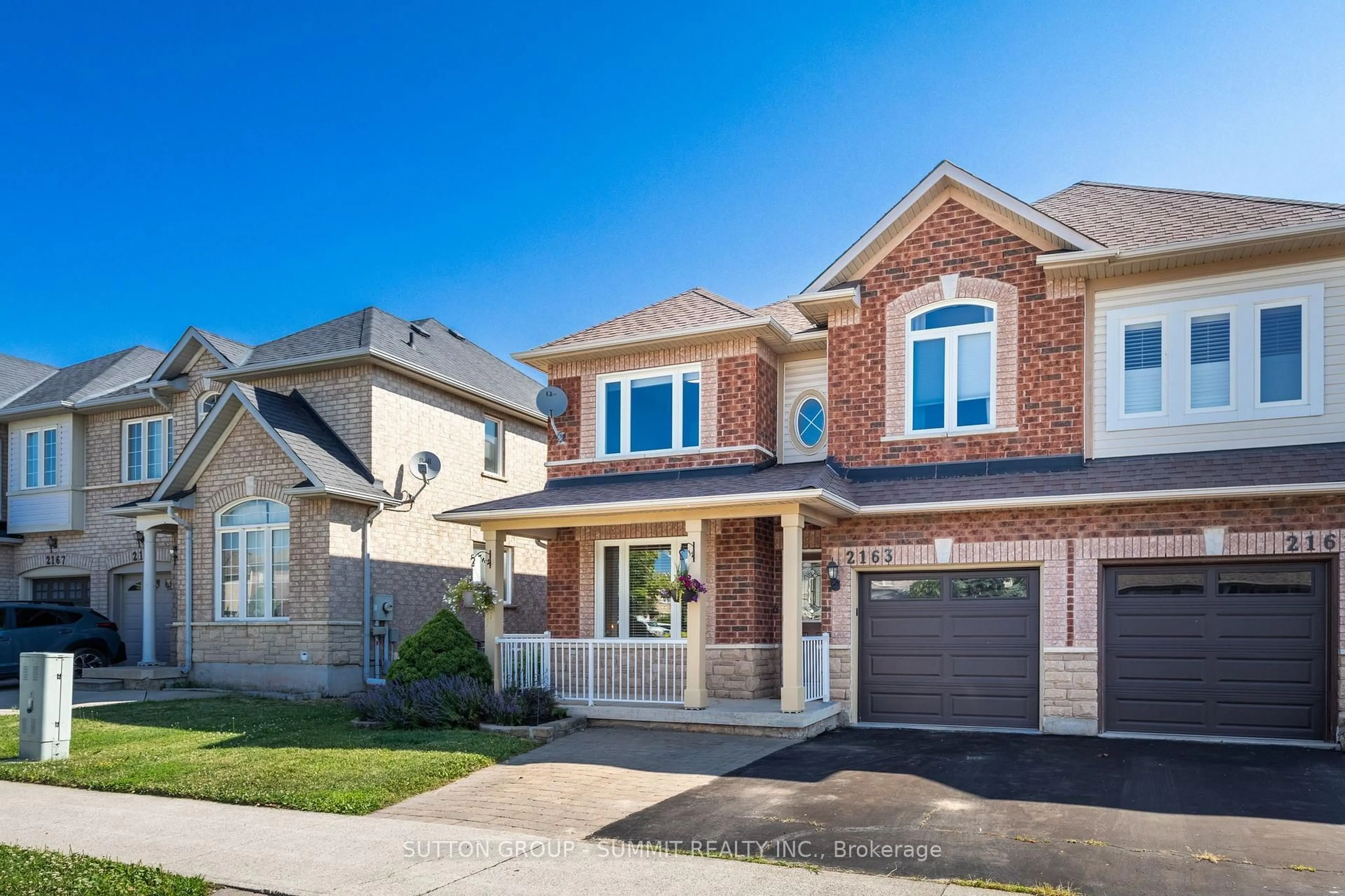 Home with brick exterior material, street for 2163 SUTTON Dr, Burlington Ontario L7L 7K5