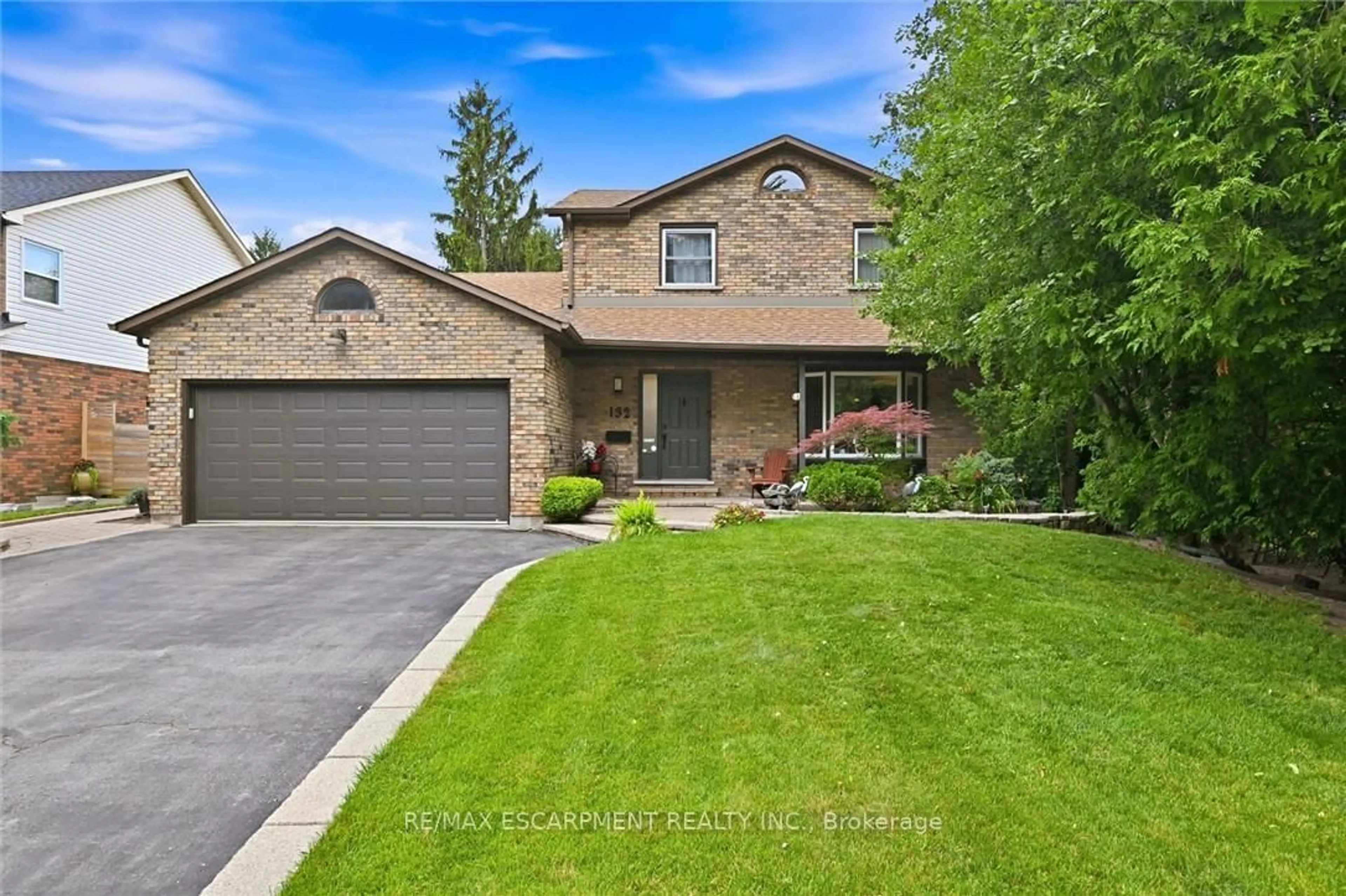 Home with brick exterior material, street for 132 Hampton Heath Rd, Burlington Ontario L7L 4N9