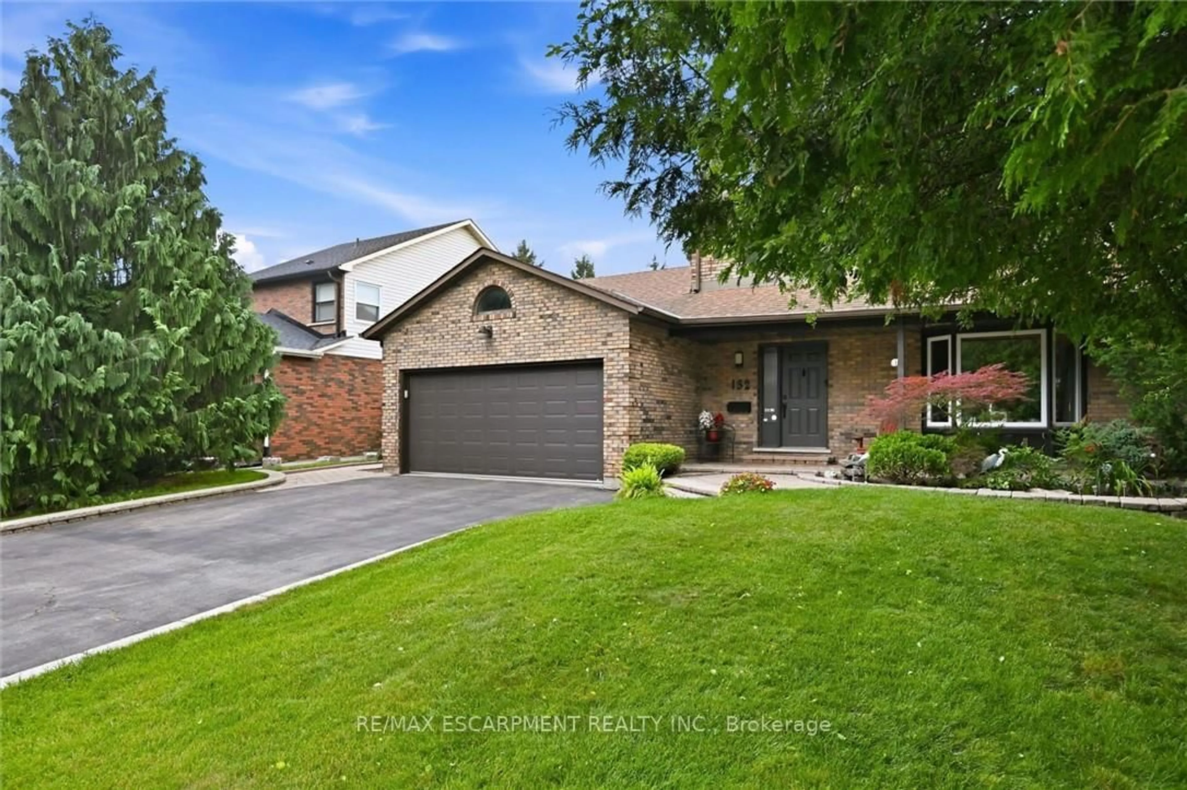 Home with brick exterior material, street for 132 Hampton Heath Rd, Burlington Ontario L7L 4N9