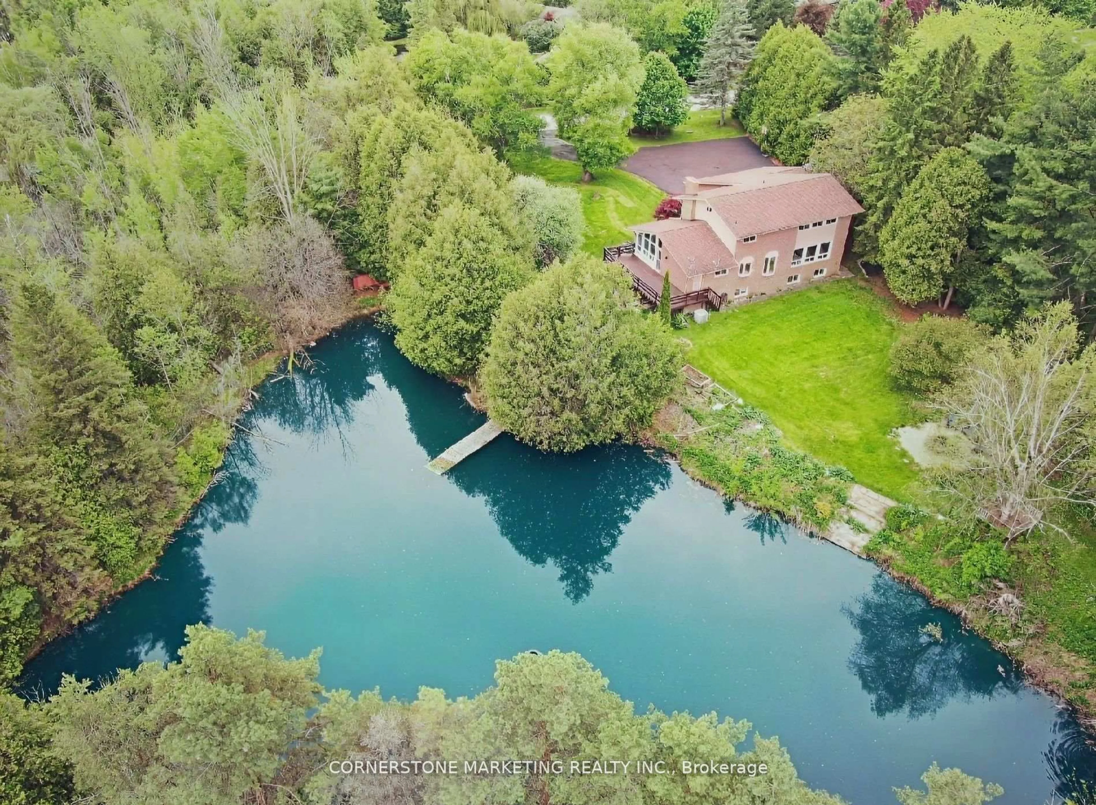 A pic from outside/outdoor area/front of a property/back of a property/a pic from drone, water/lake/river/ocean view for 1 Cedar Dr, Caledon Ontario L7K 1H4