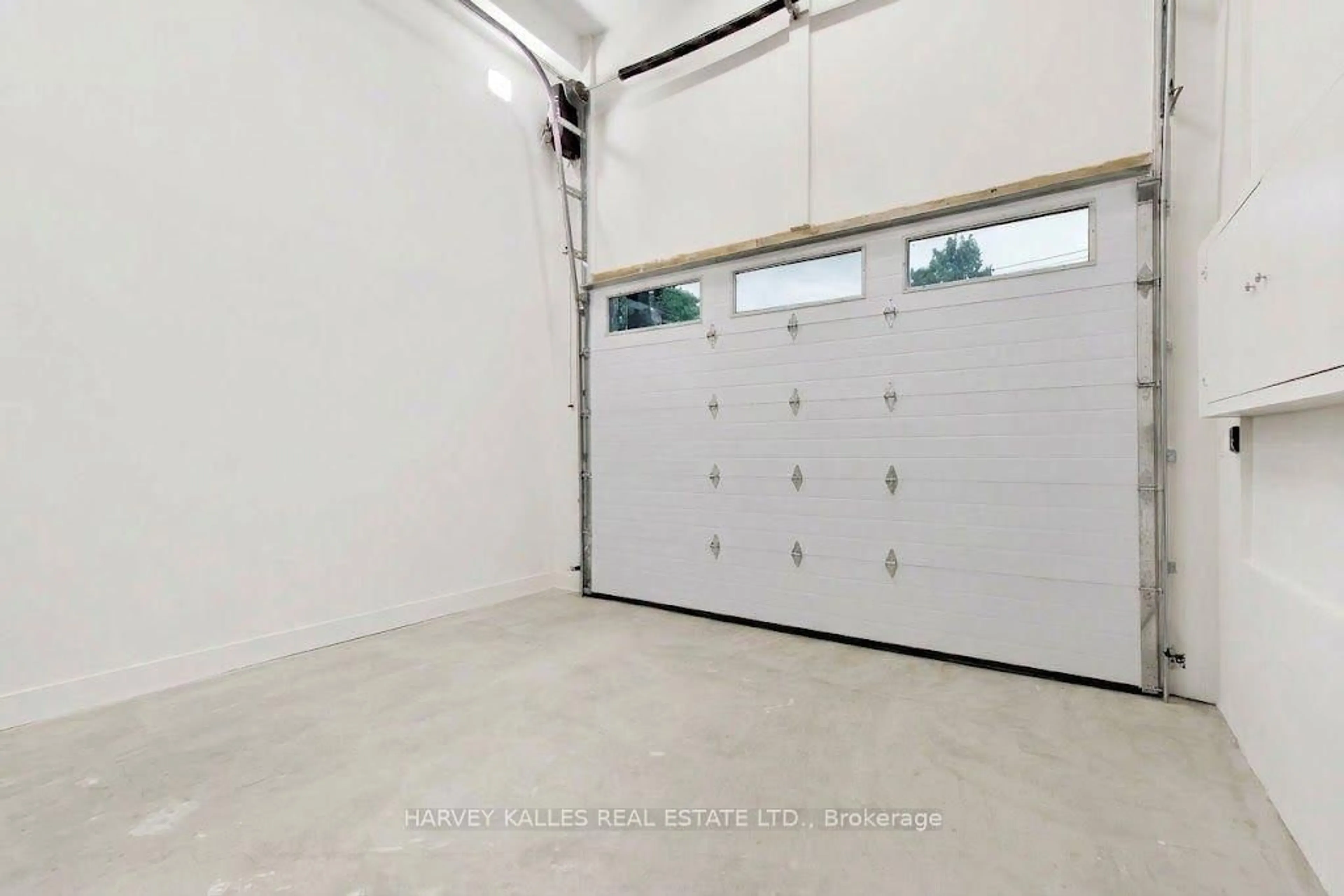 Indoor garage for 24 Ravenscrest Dr, Toronto Ontario M9B 5M7