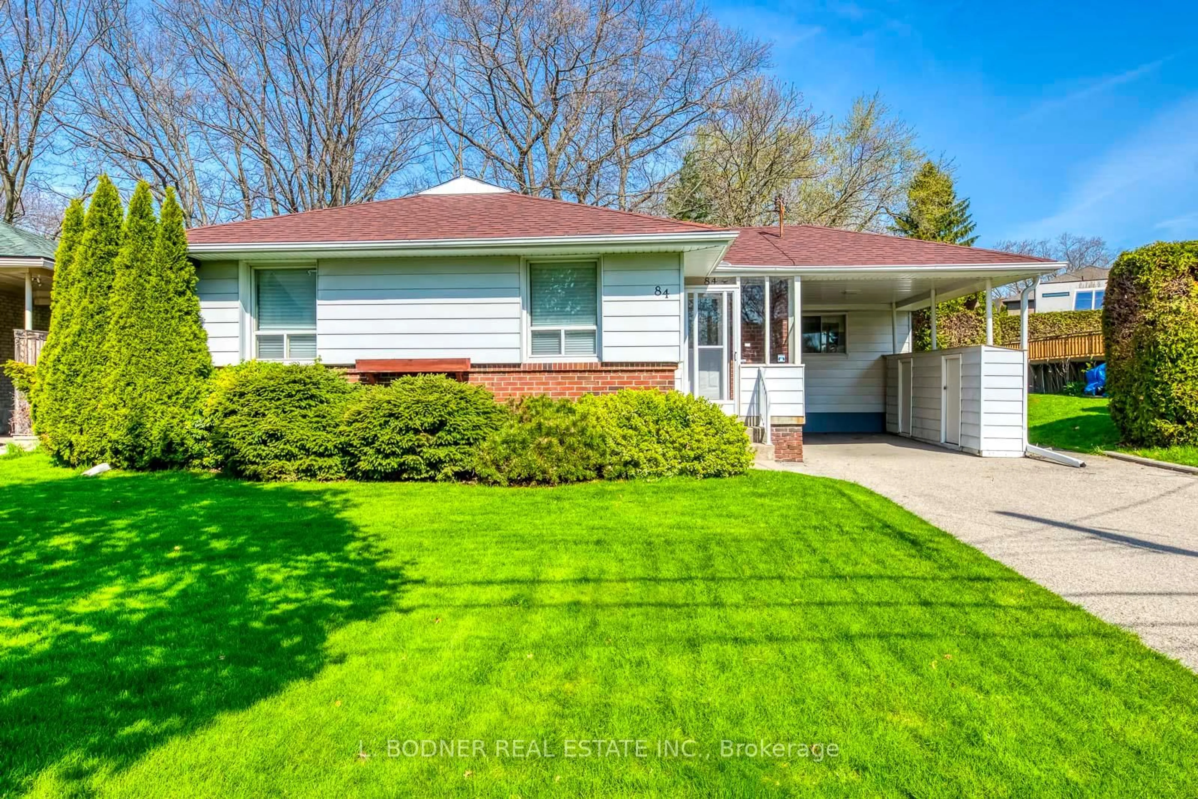 Home with vinyl exterior material, street for 84 Ravenscrest Dr, Toronto Ontario M9B 5N3