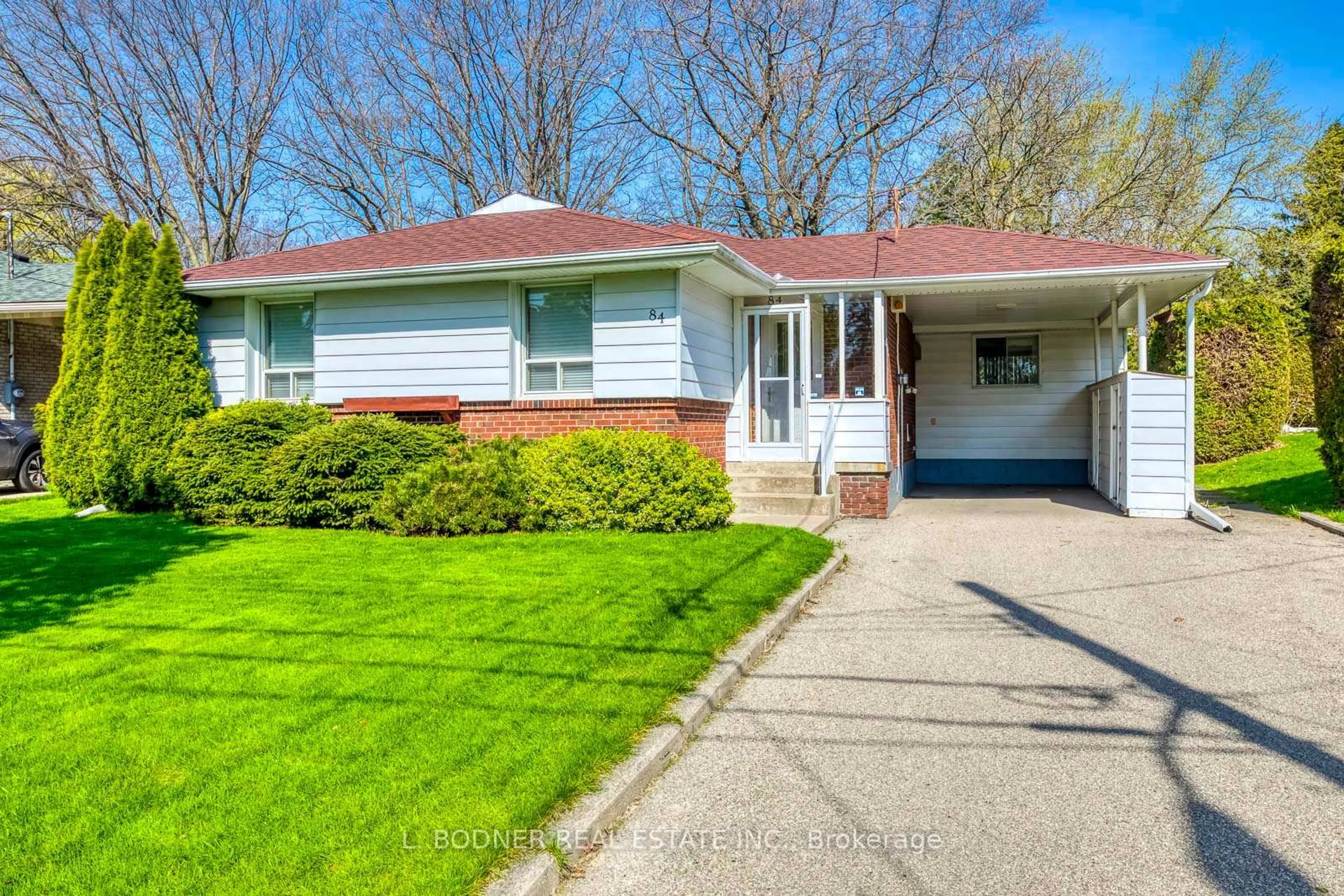 Home with vinyl exterior material, street for 84 Ravenscrest Dr, Toronto Ontario M9B 5N3