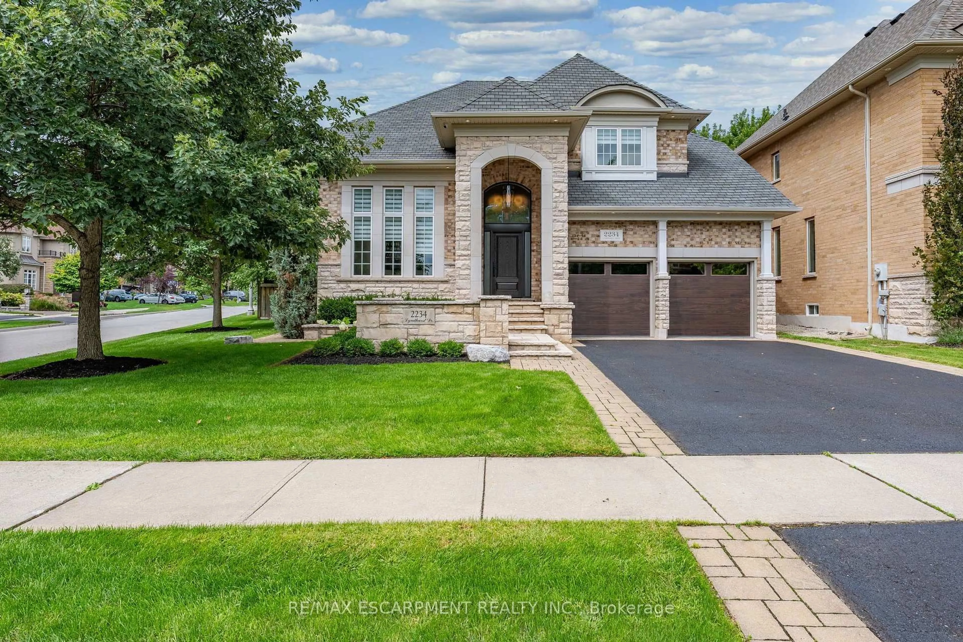 Home with brick exterior material, street for 2234 Lyndhurst Dr, Oakville Ontario L6H 7V4