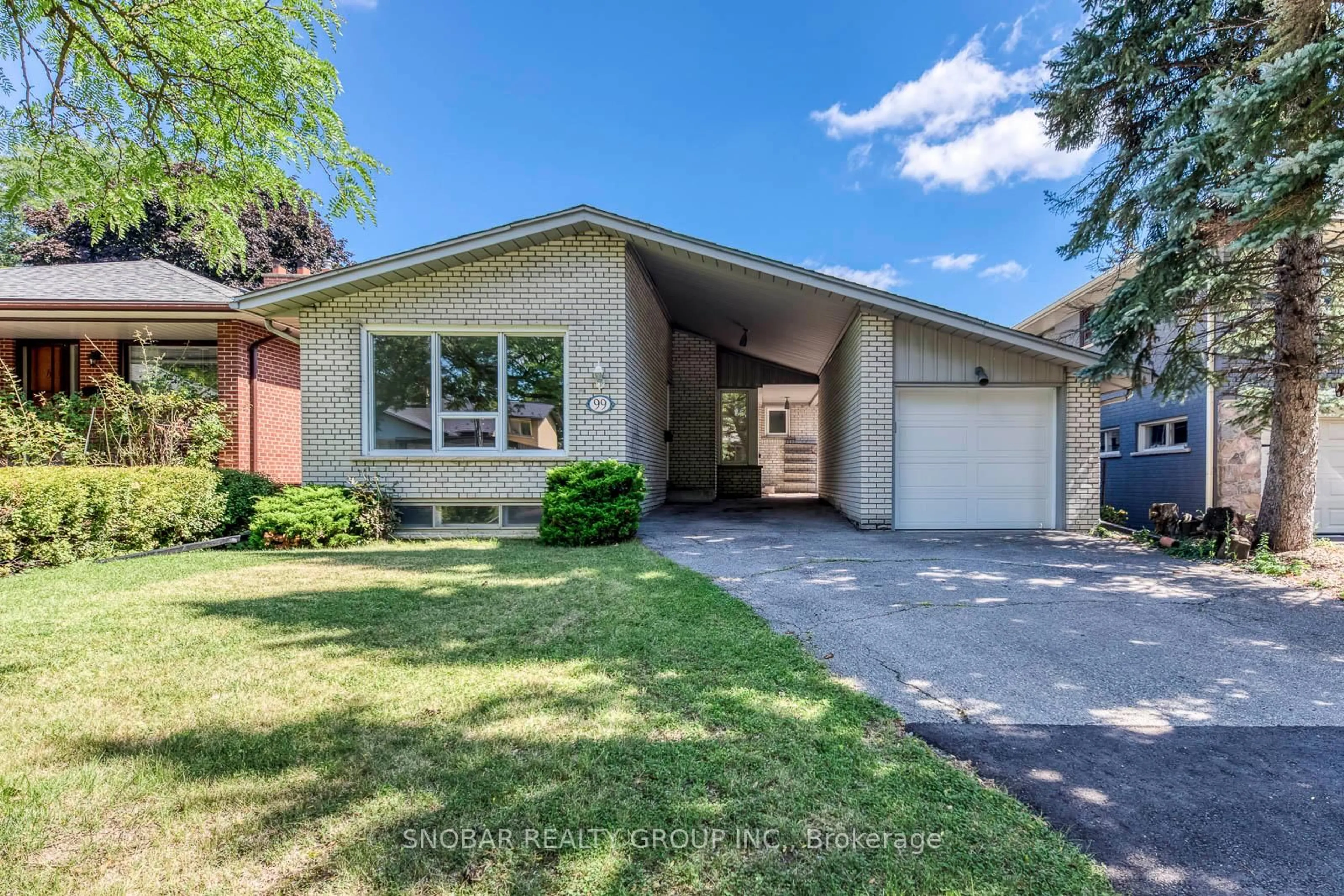 Home with brick exterior material, street for 99 Sun Row Dr, Toronto Ontario M9P 3J3