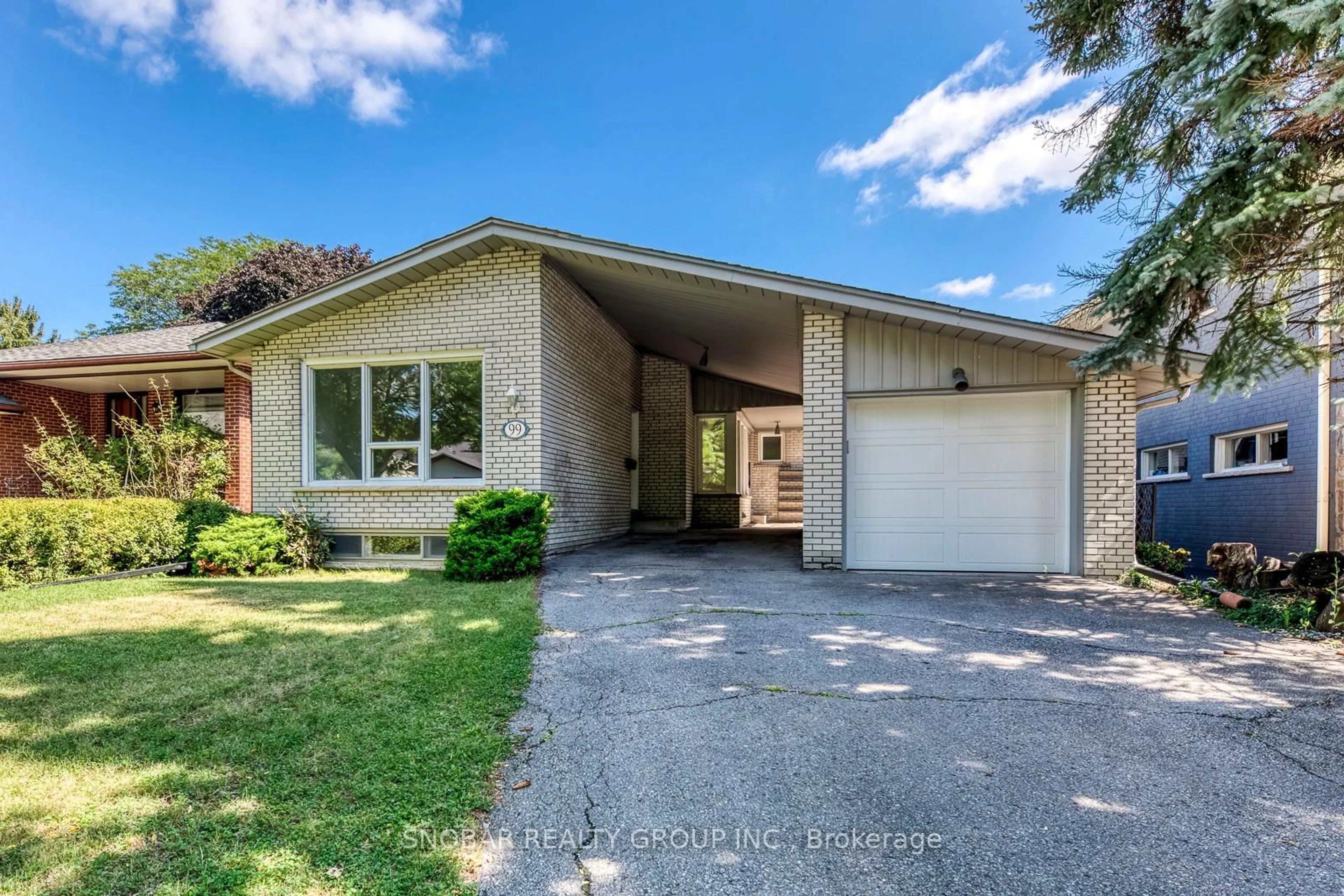 Home with brick exterior material, street for 99 Sun Row Dr, Toronto Ontario M9P 3J3