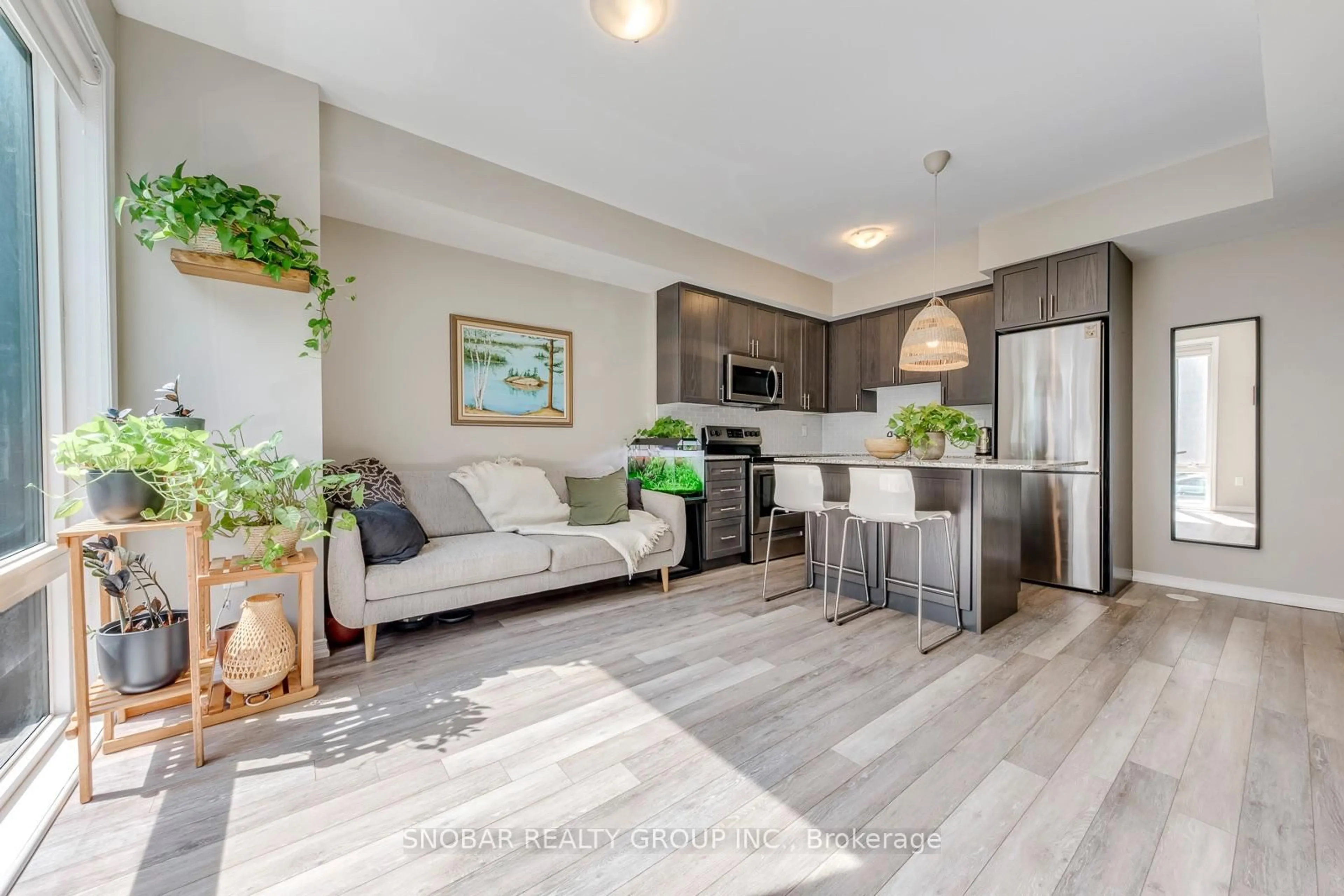 Open concept kitchen, wood/laminate floor for 30 Fieldway Rd #77, Toronto Ontario M8Z 0E3