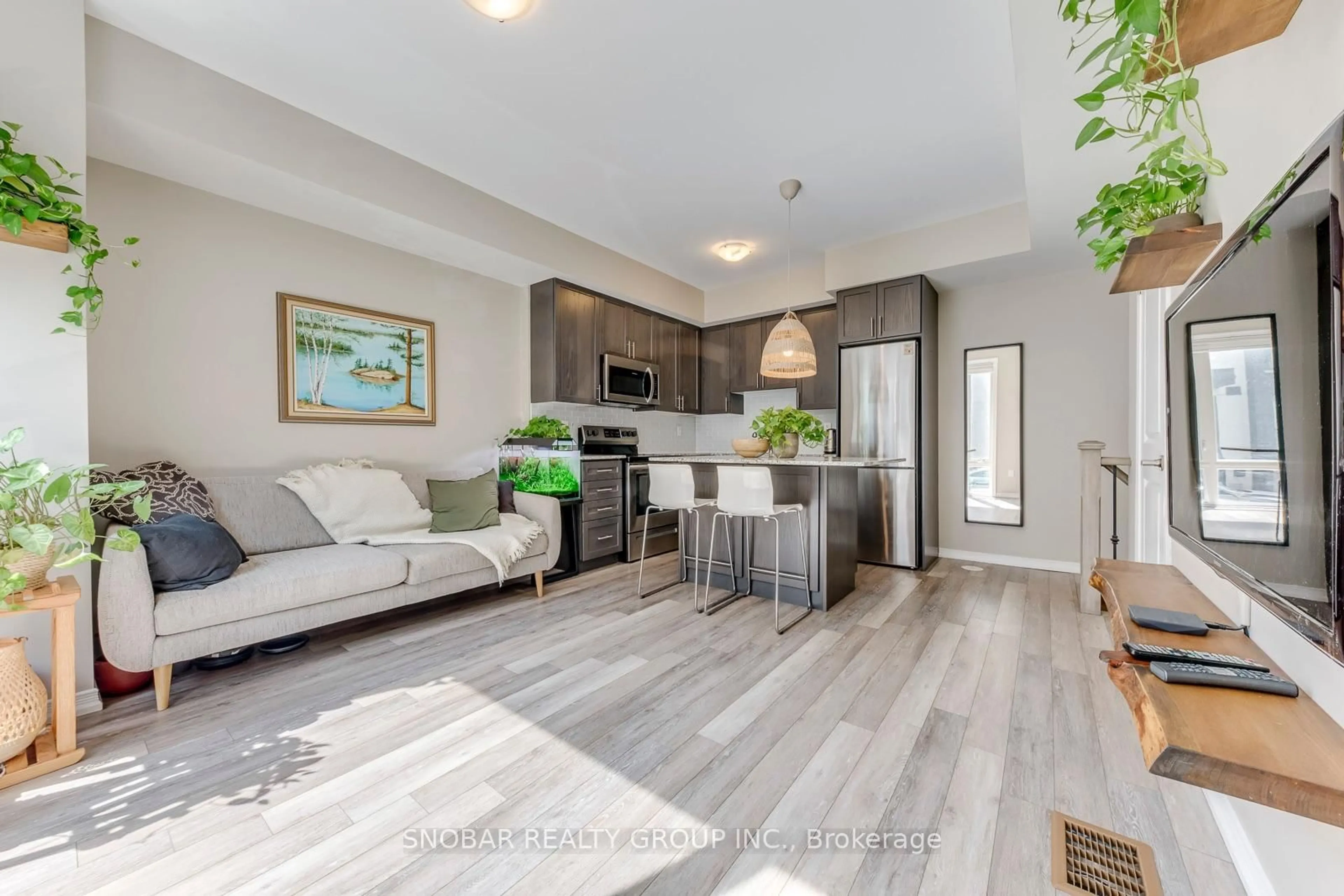 Open concept kitchen, wood/laminate floor for 30 Fieldway Rd #77, Toronto Ontario M8Z 0E3