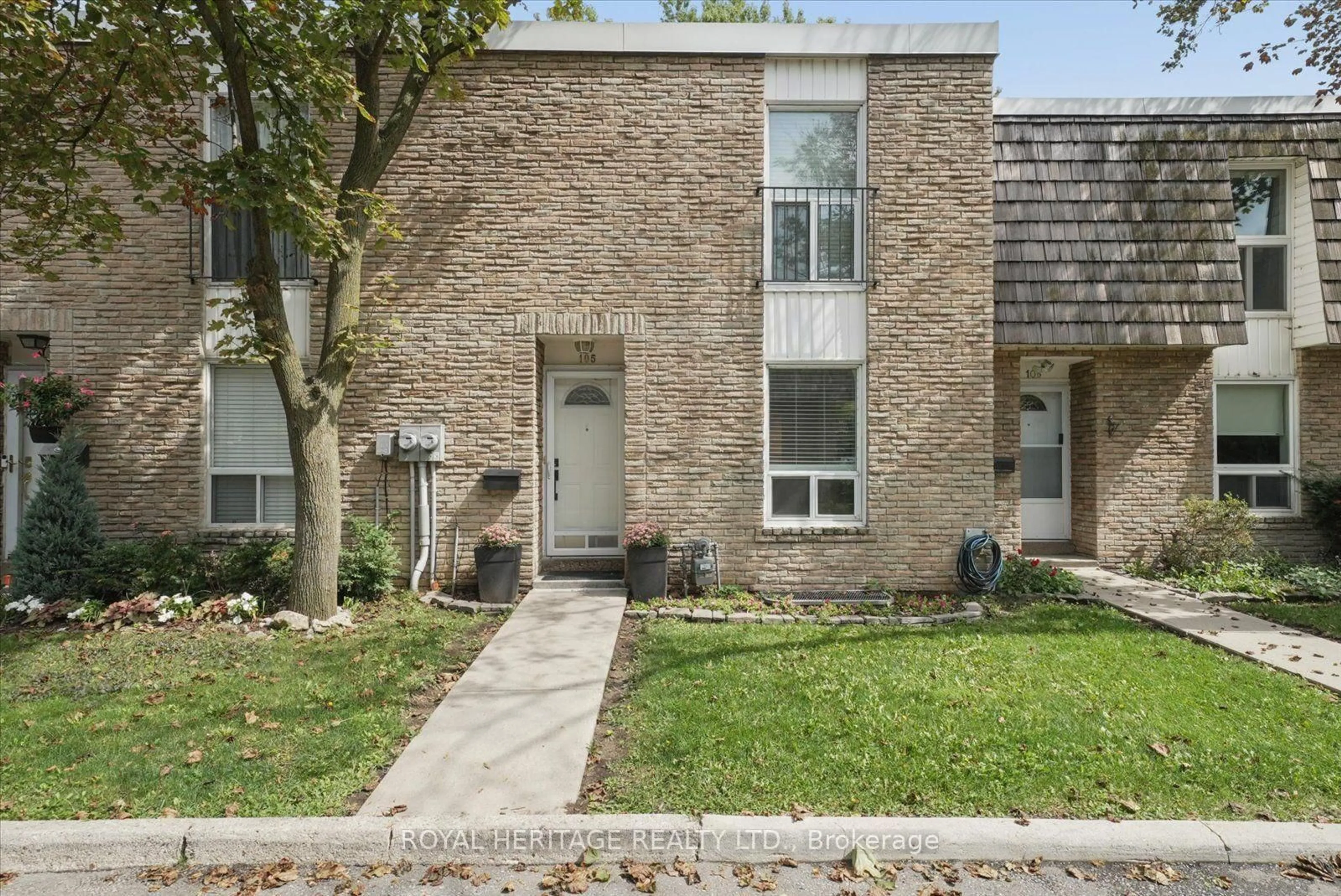 Home with brick exterior material, street for 701 Burnhamthorpe Rd #105, Toronto Ontario M9C 2Z6