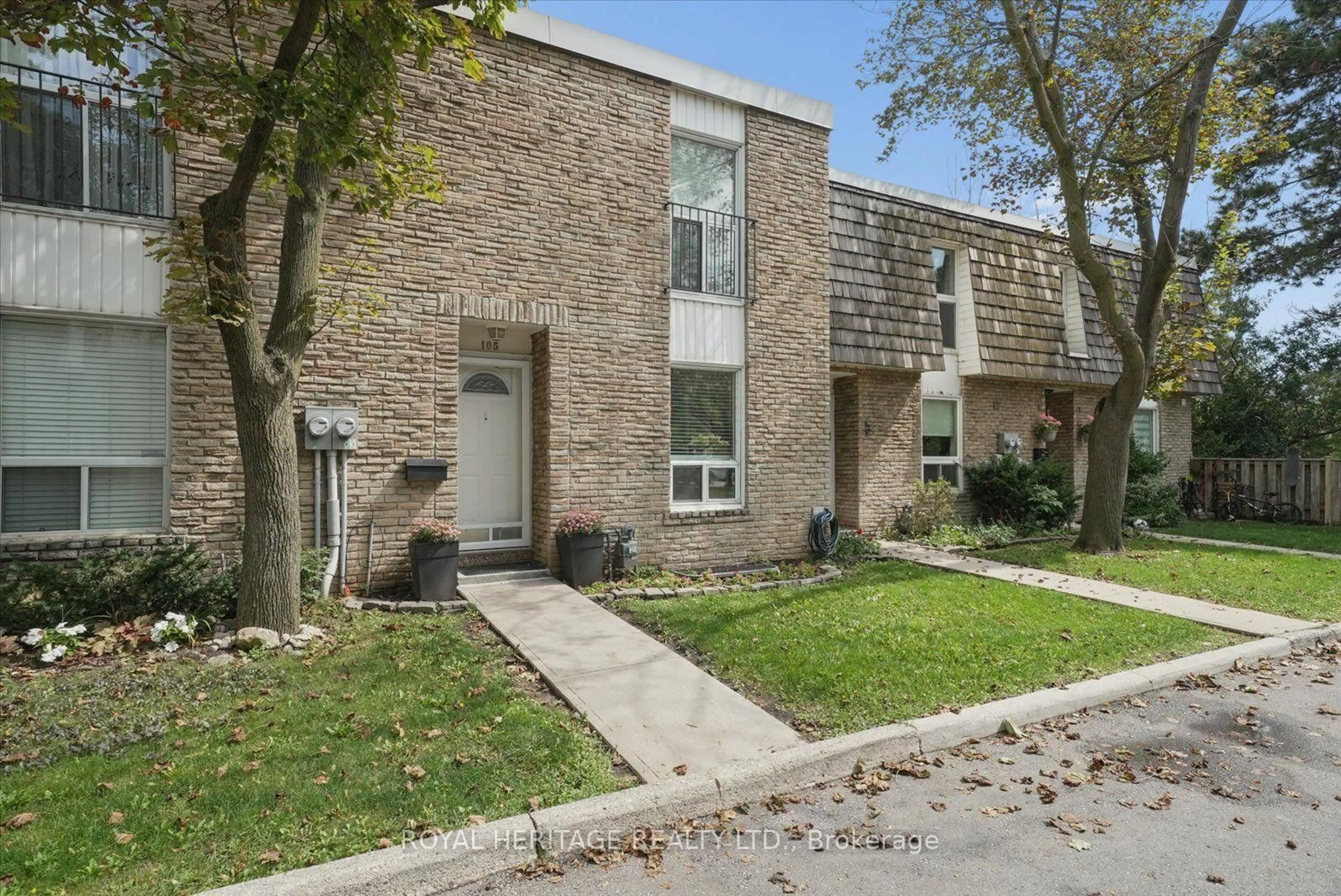Home with brick exterior material, street for 701 Burnhamthorpe Rd #105, Toronto Ontario M9C 2Z6