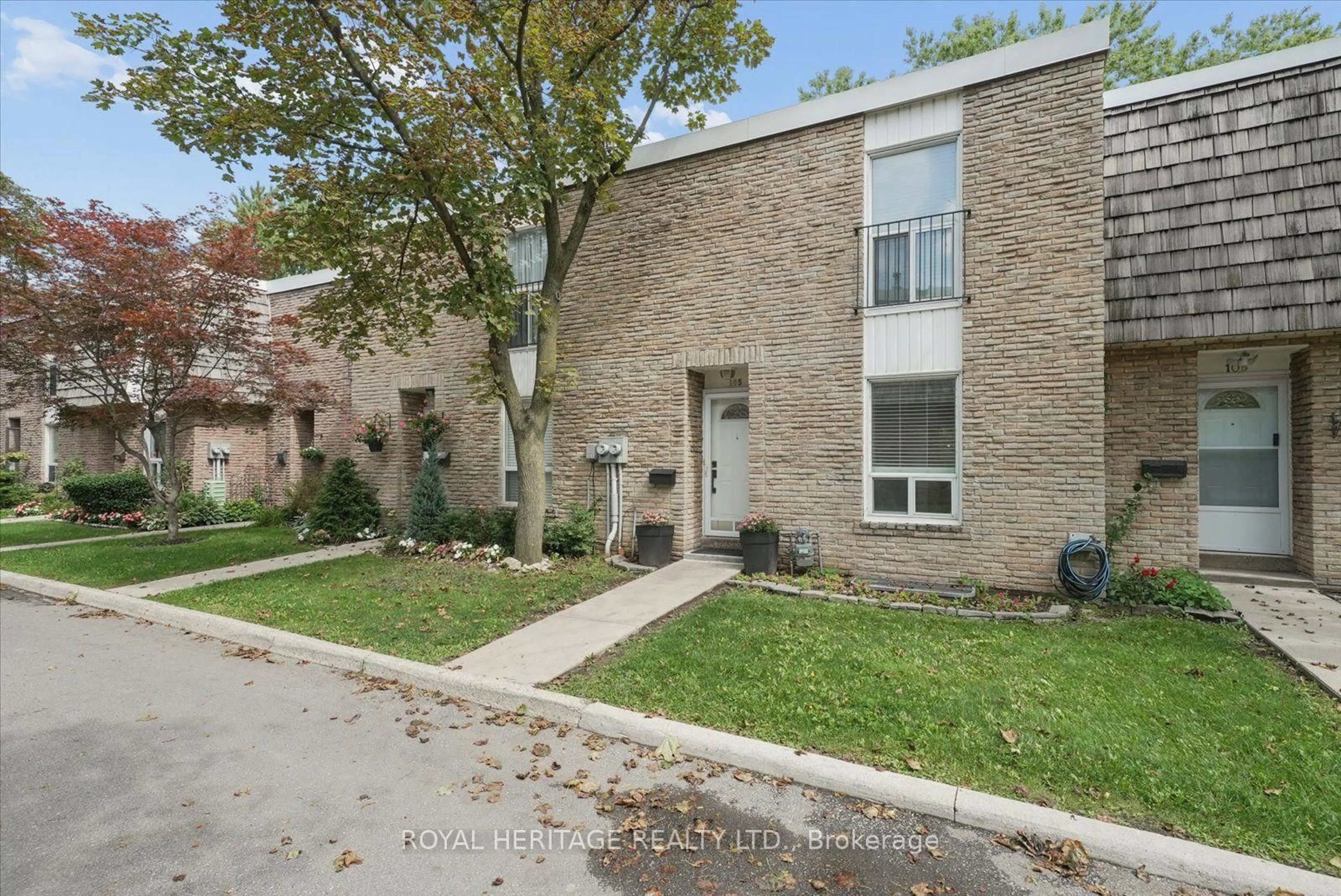 Home with brick exterior material, street for 701 Burnhamthorpe Rd #105, Toronto Ontario M9C 2Z6