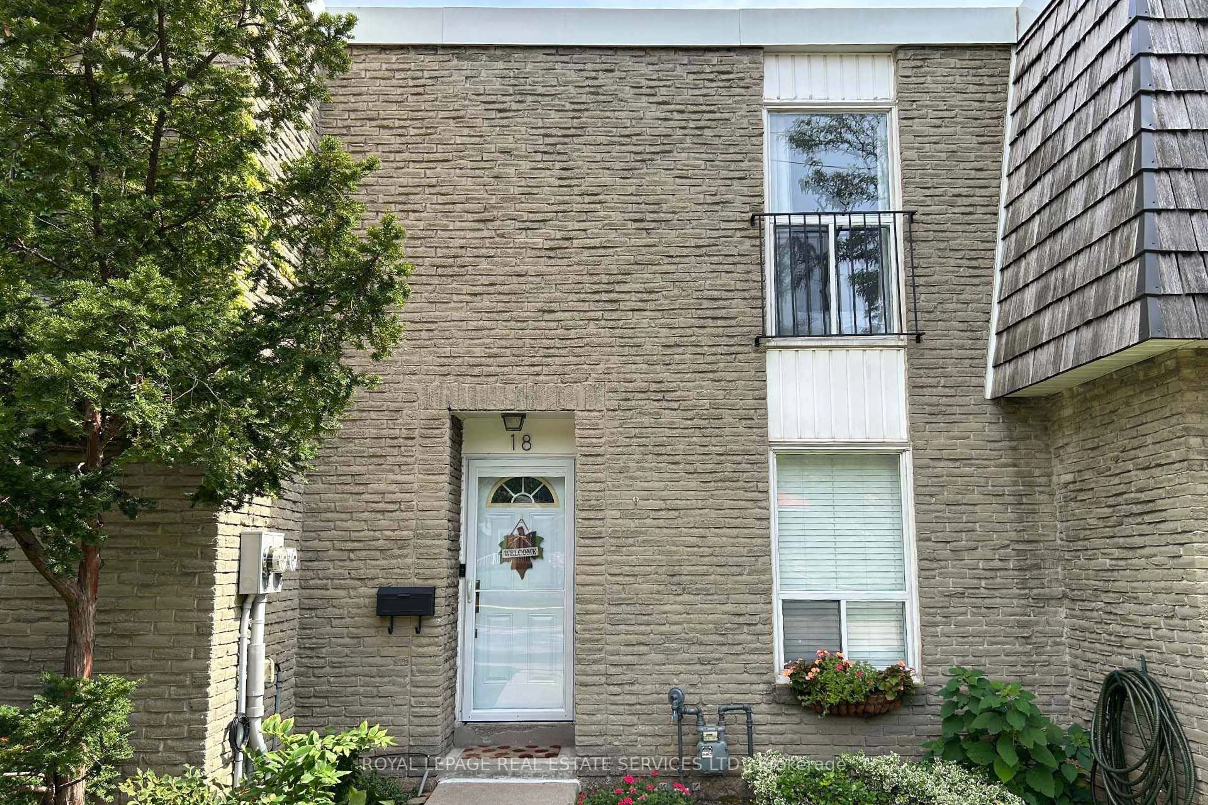 Home with brick exterior material, street for 71 Old Burnhamthorpe Rd #18, Toronto Ontario M9C 3J6