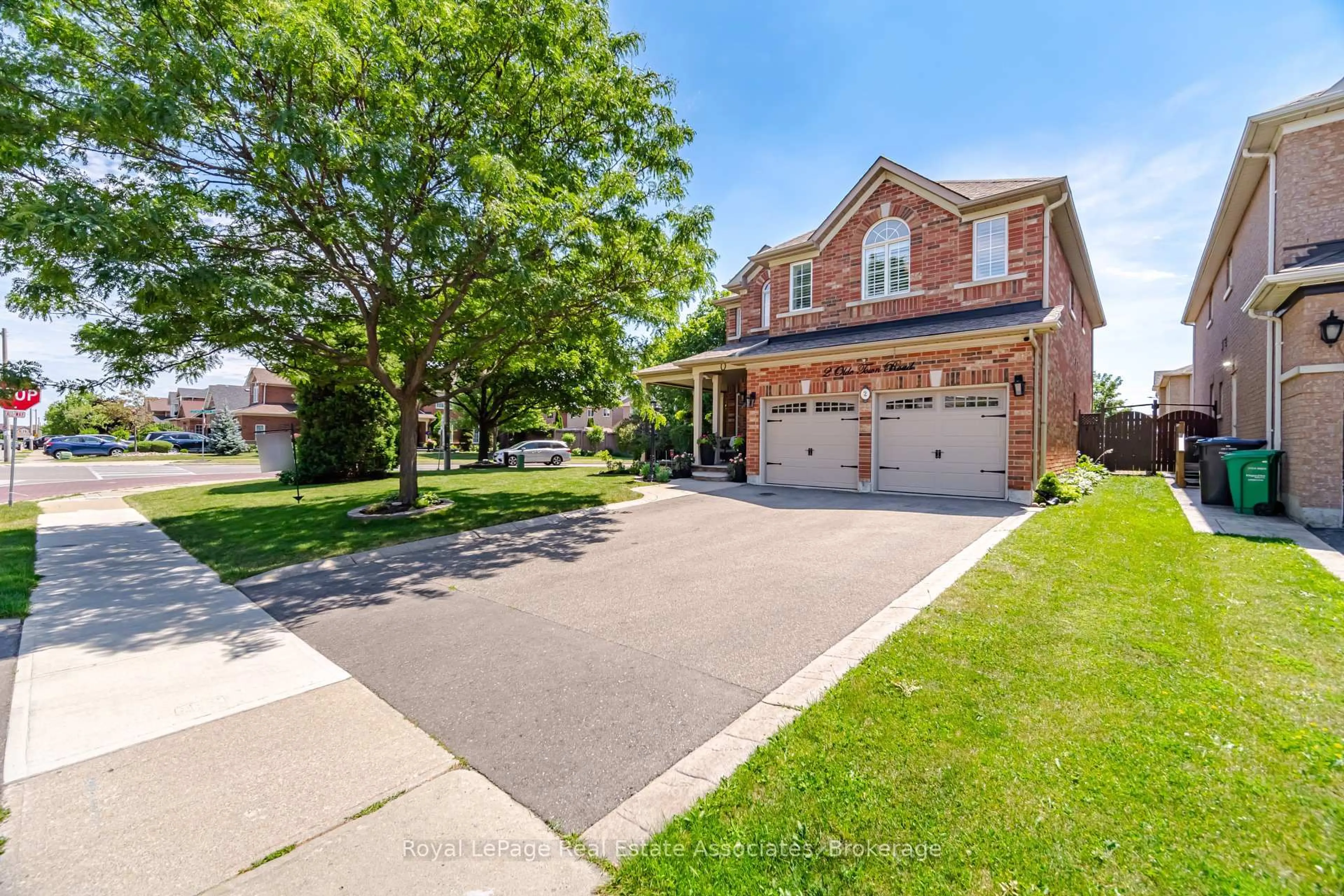 Home with brick exterior material, street for 2 Olde Town Rd, Brampton Ontario L6X 4V3