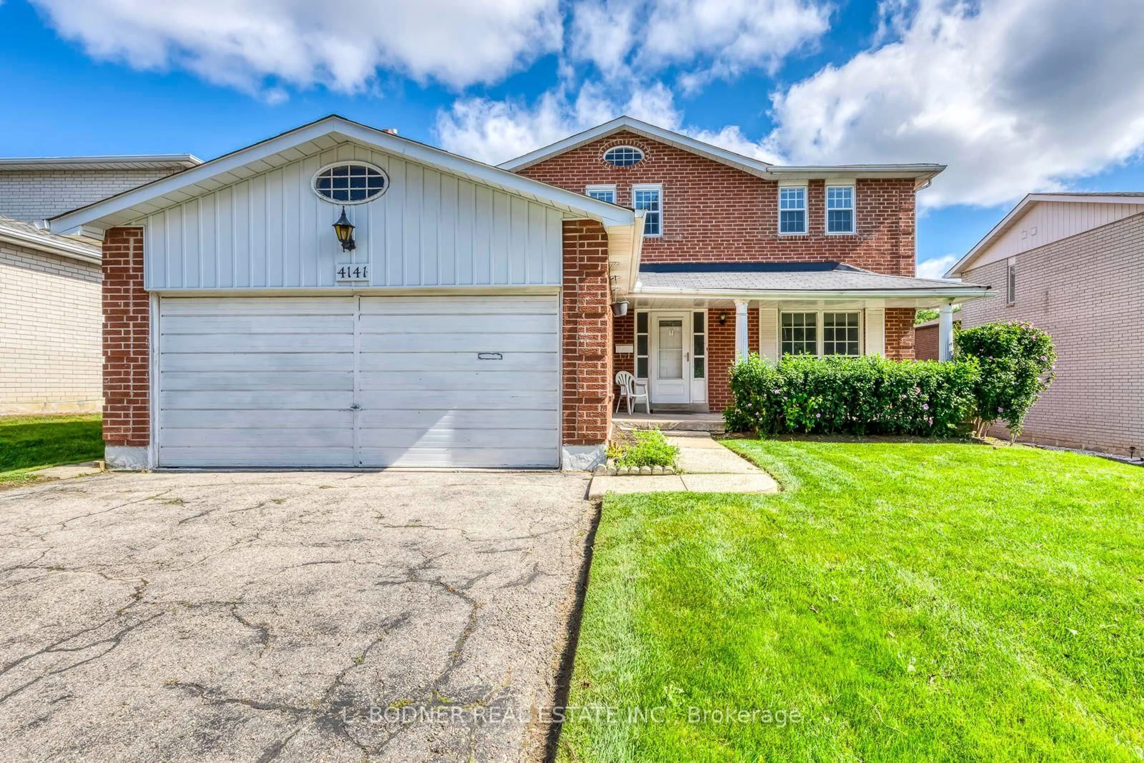 Home with brick exterior material, street for 4141 Garrowhill Tr, Mississauga Ontario L4W 2H5