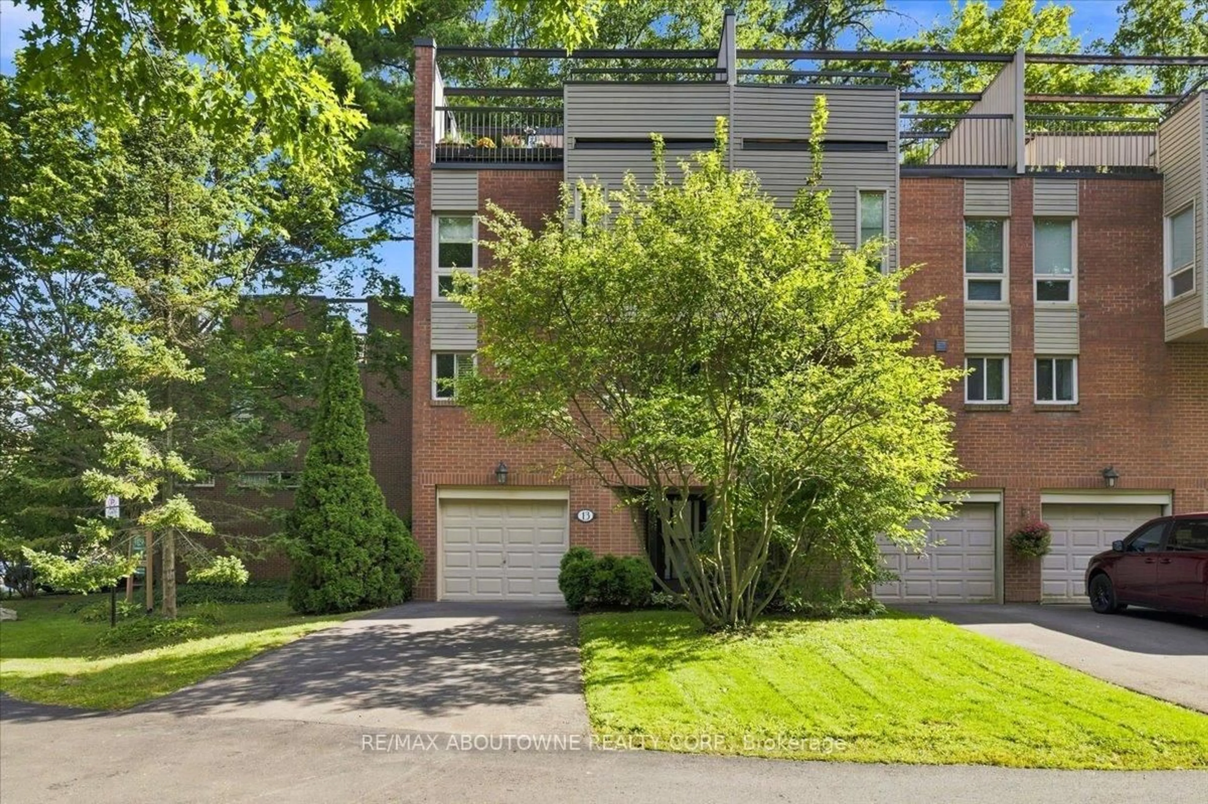 Home with brick exterior material, street for 1250 Marlborough Crt #13, Oakville Ontario L6H 2W7