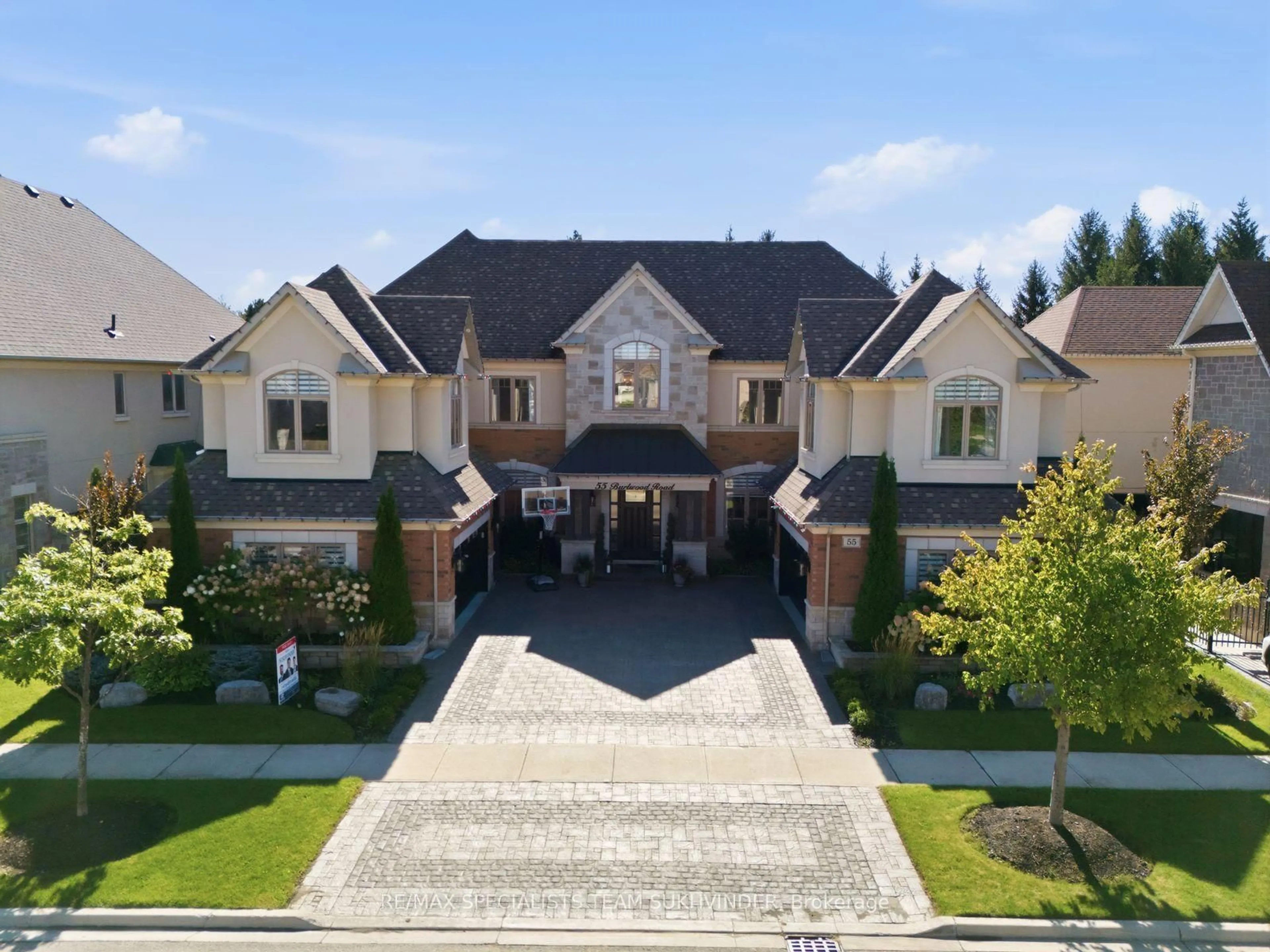 A pic from outside/outdoor area/front of a property/back of a property/a pic from drone, street for 55 Burlwood Rd, Brampton Ontario L6P 4E7
