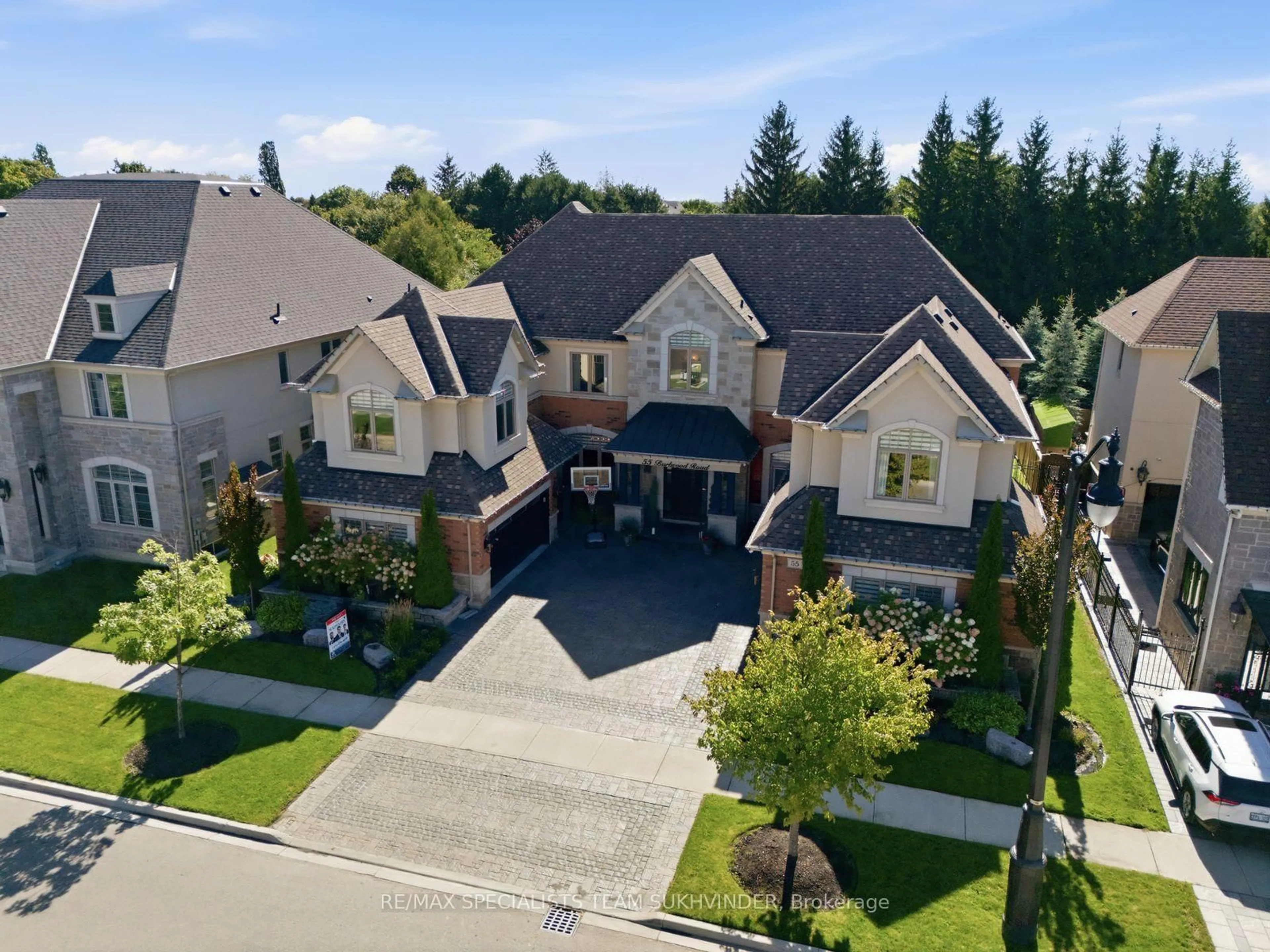 A pic from outside/outdoor area/front of a property/back of a property/a pic from drone, street for 55 Burlwood Rd, Brampton Ontario L6P 4E7