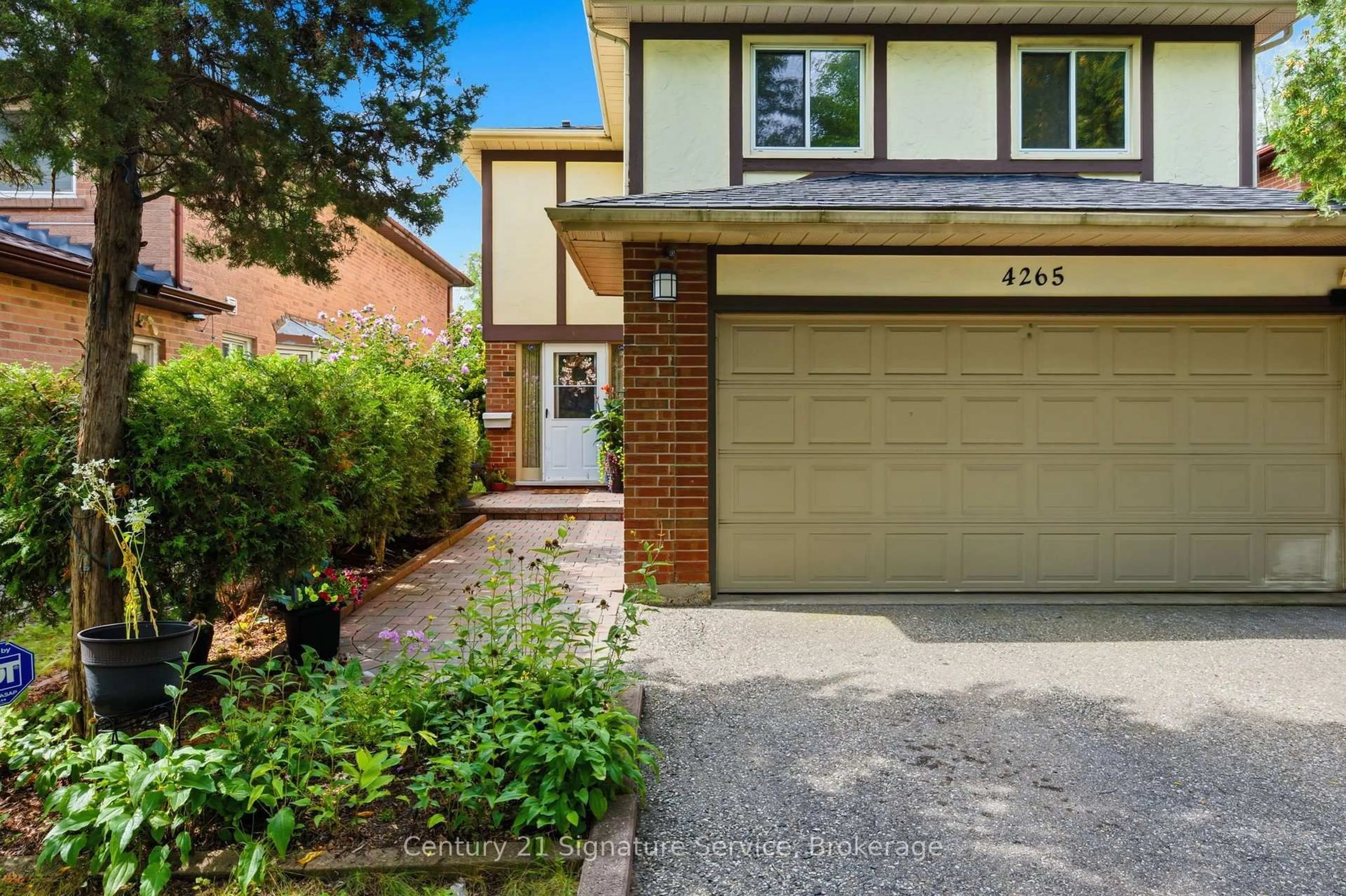 Home with brick exterior material, street for 4265 Tea Garden Circ, Mississauga Ontario L5B 2Z1