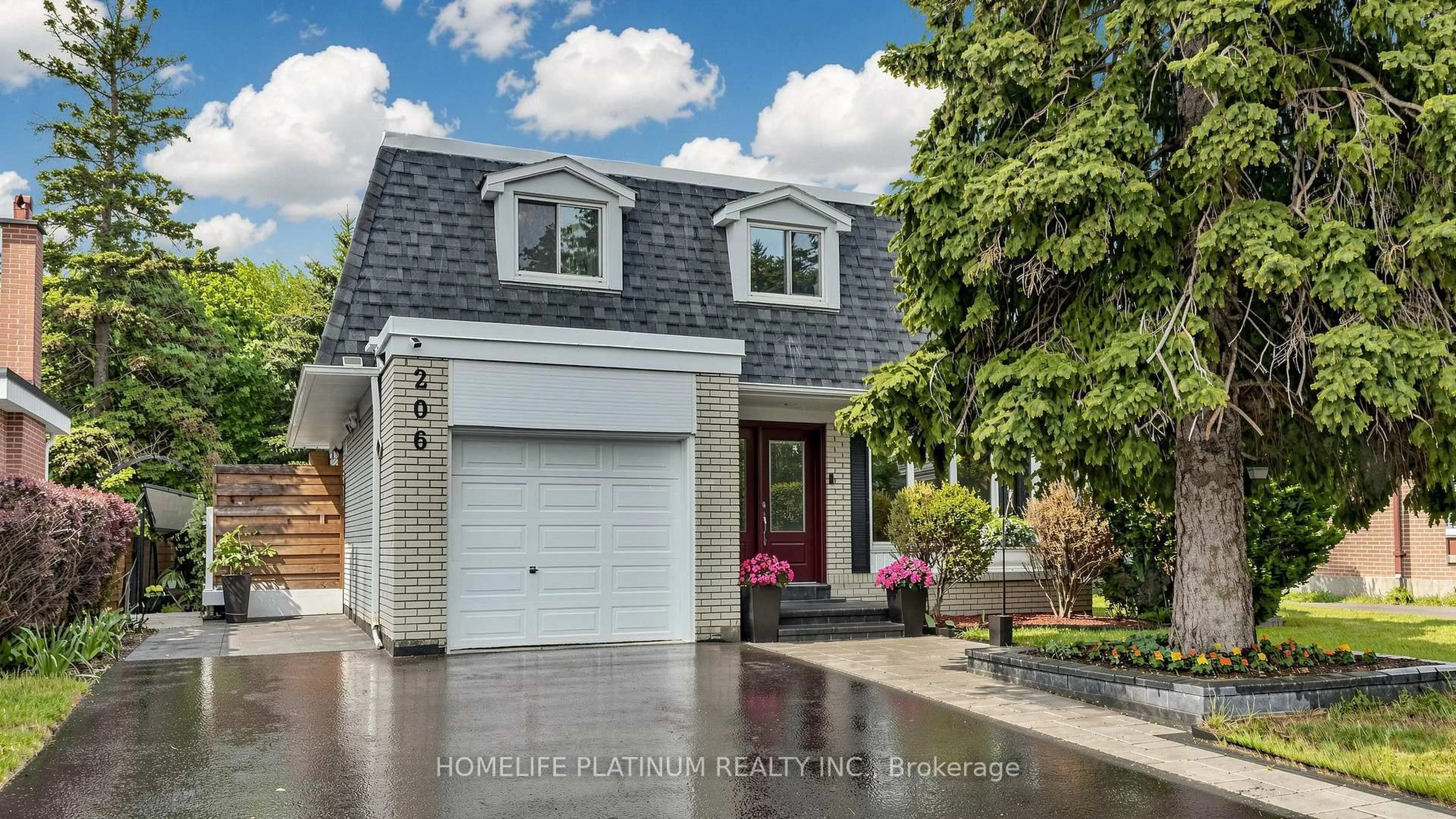 Home with vinyl exterior material, street for 206 Mcmurchy Ave, Brampton Ontario L6Y 1Z3