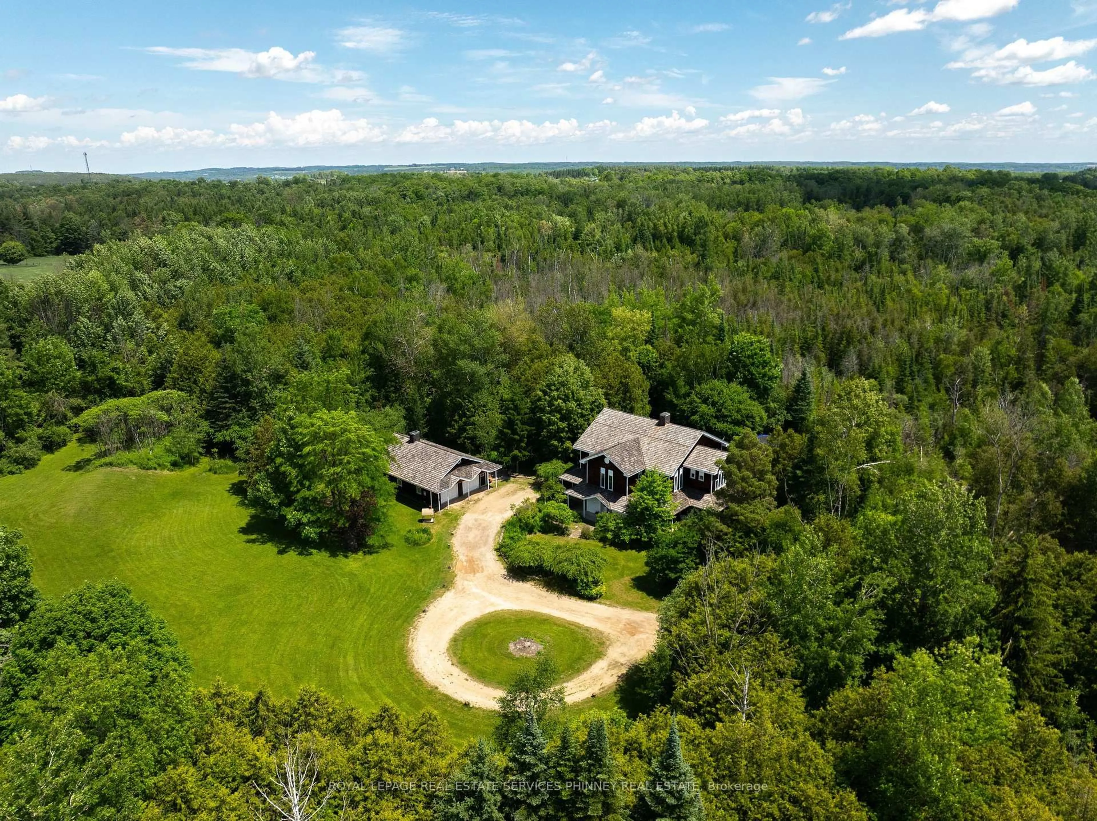 A pic from outside/outdoor area/front of a property/back of a property/a pic from drone, forest/trees view for 19555 Shaws Creek Rd, Caledon Ontario L7K 1L5