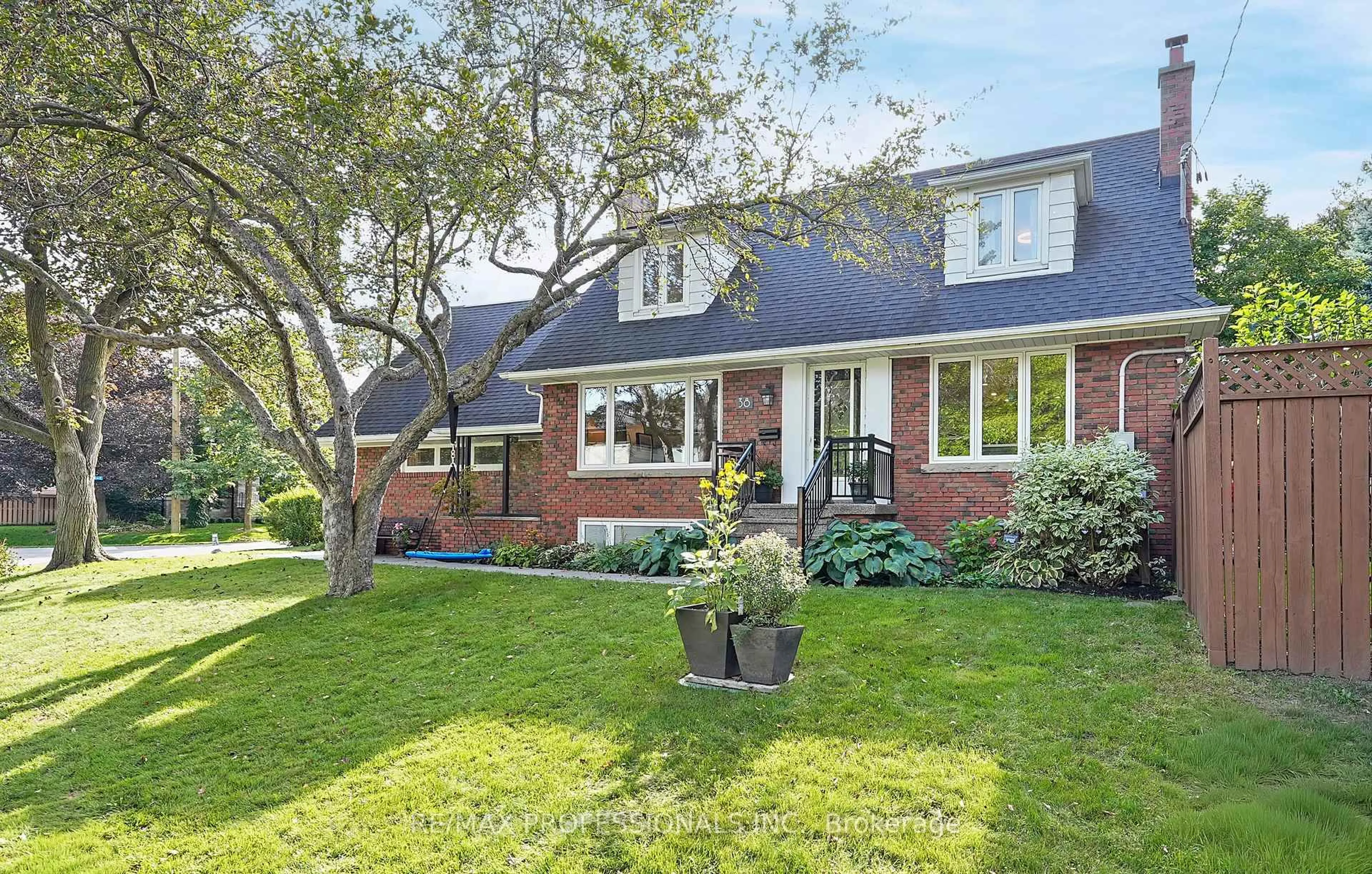 Home with brick exterior material, street for 38 Ballacaine Dr, Toronto Ontario M8Y 4A9