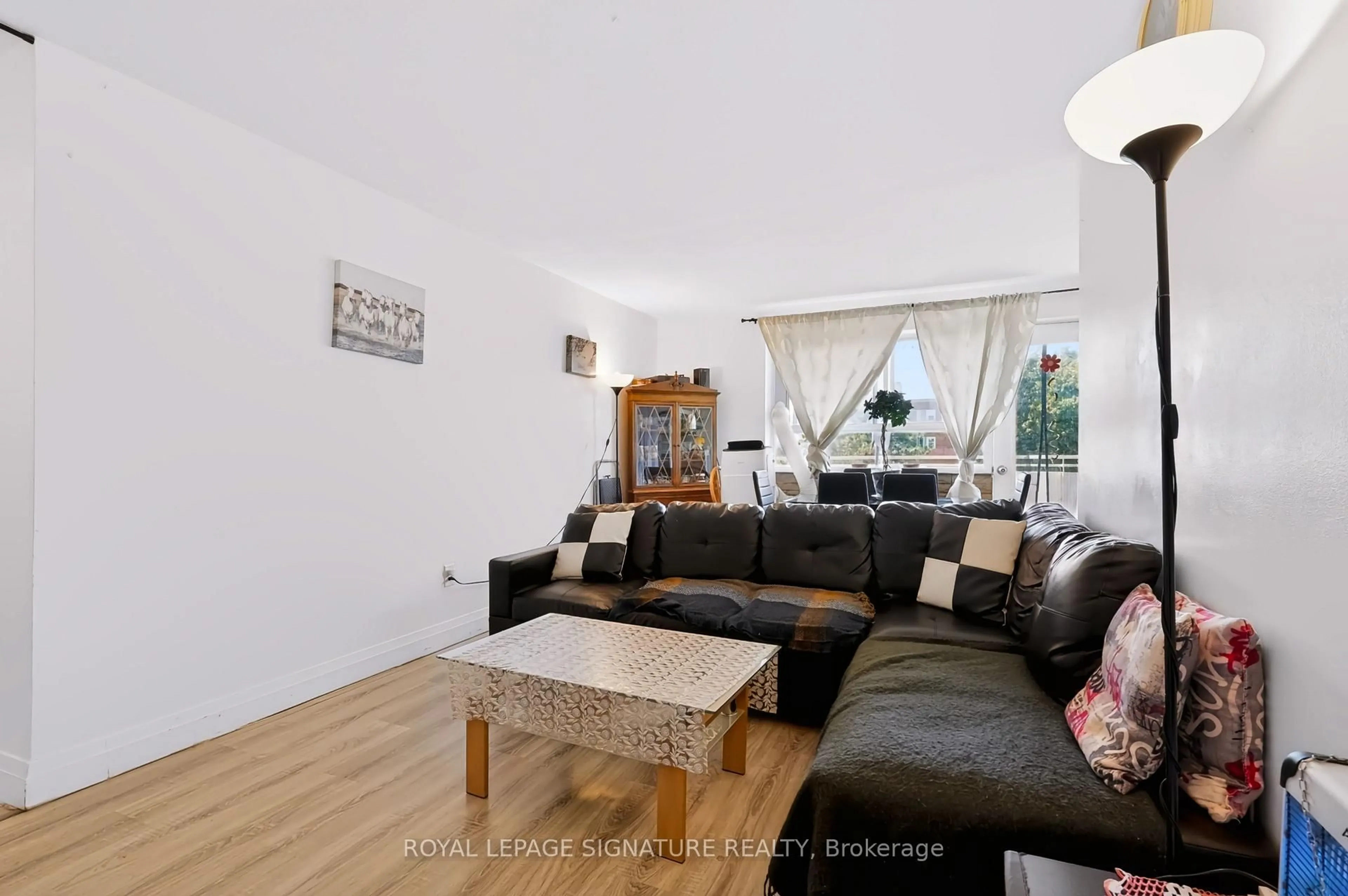 Living room with furniture, unknown for 2485 Woking Cres #401, Mississauga Ontario L5K 1Z6