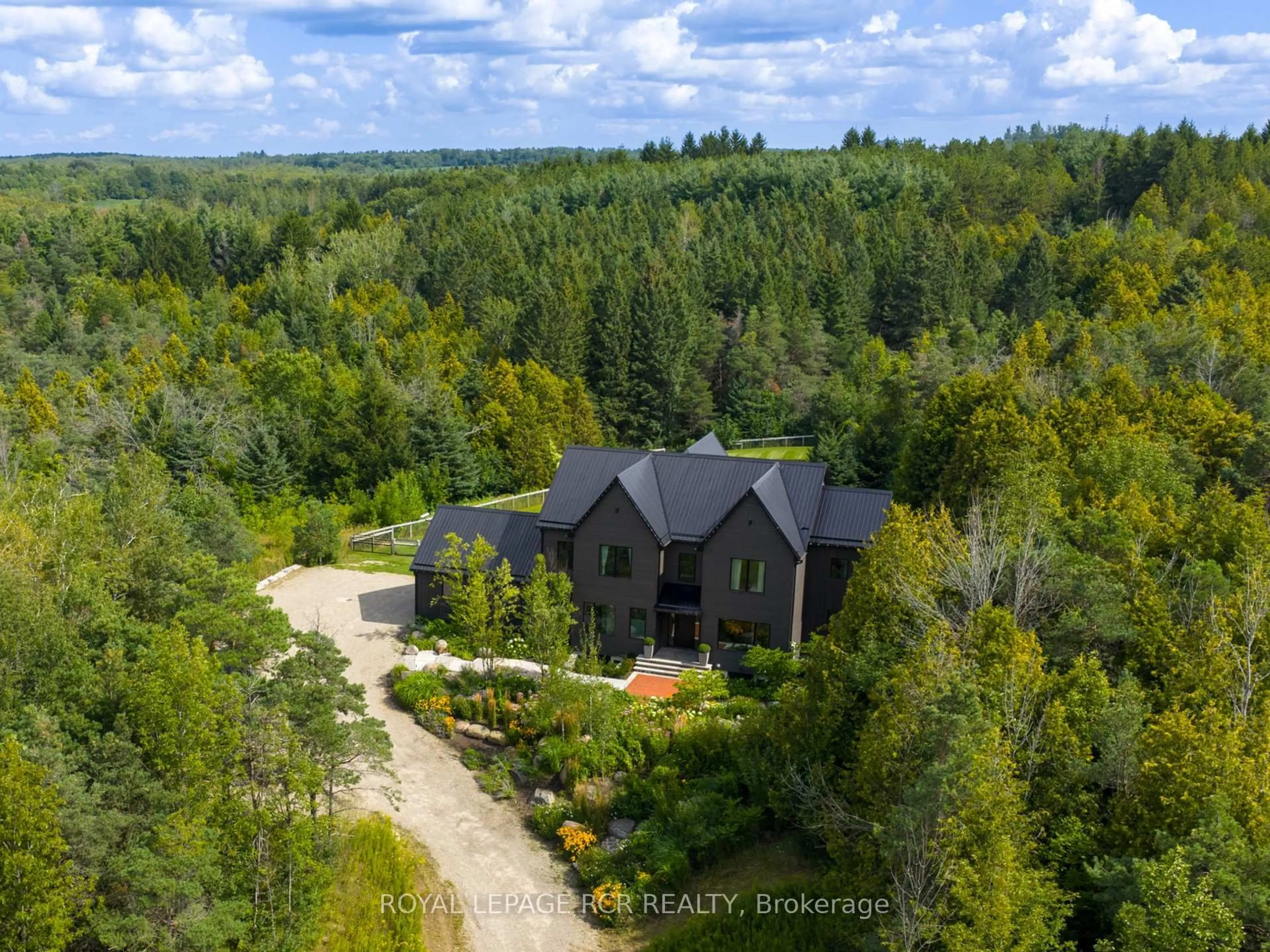 A pic from outside/outdoor area/front of a property/back of a property/a pic from drone, forest/trees view for 3045 Highpoint Sdrd, Caledon Ontario L7K 0K5