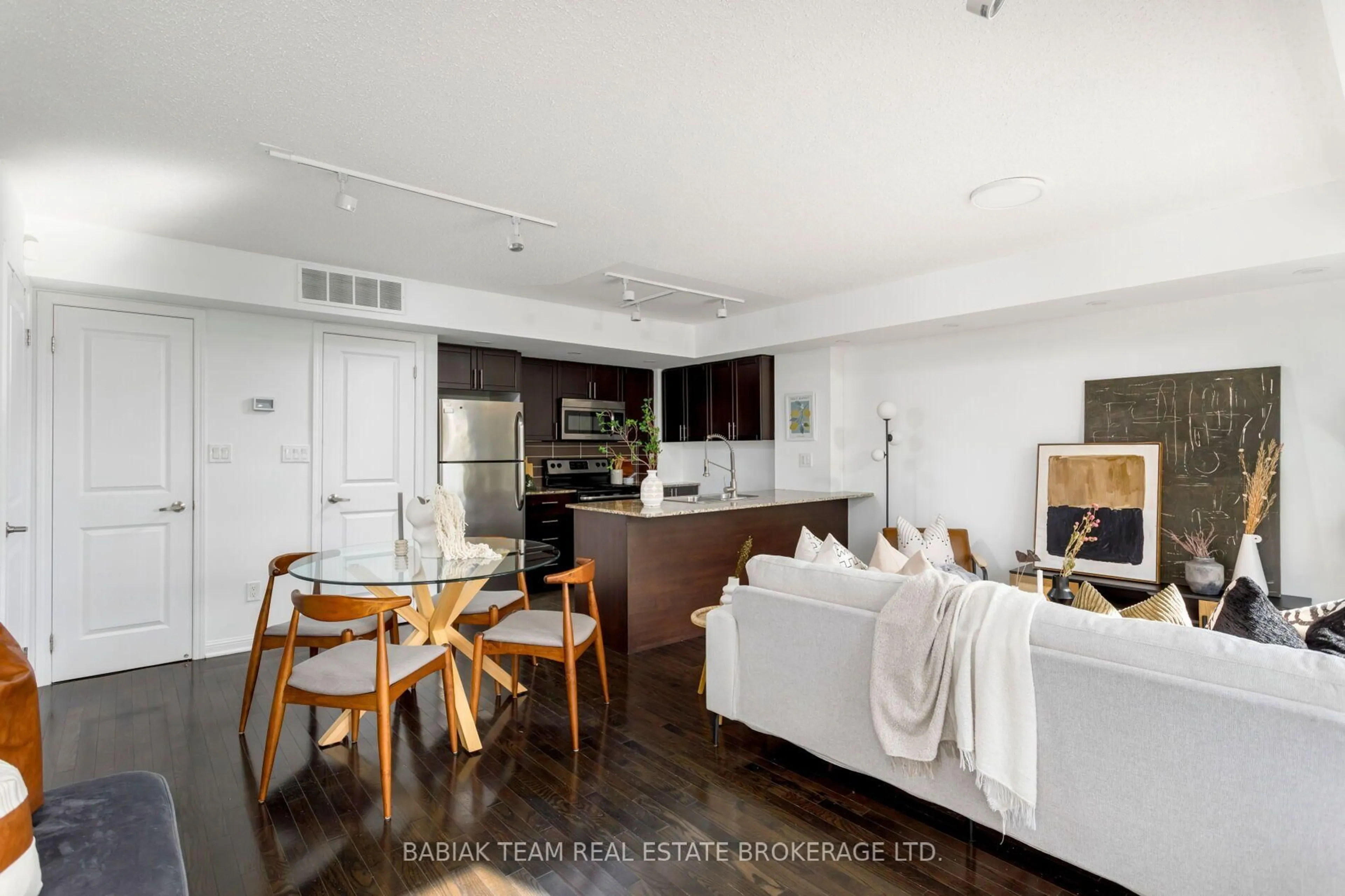 Open concept kitchen, wood/laminate floor for 8 Foundry Ave #258, Toronto Ontario M6H 0A5
