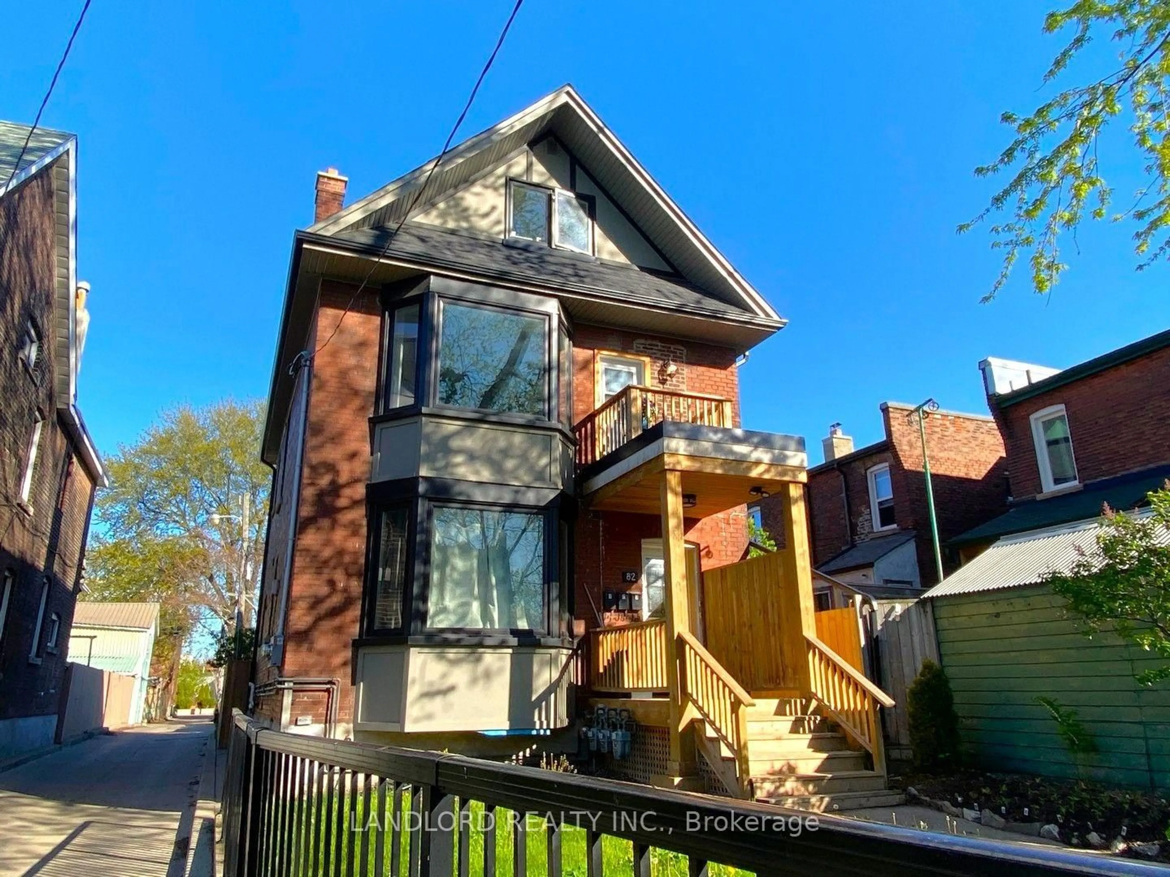 Home with brick exterior material, street for 82 Parkway Ave, Toronto Ontario M6R 1T5
