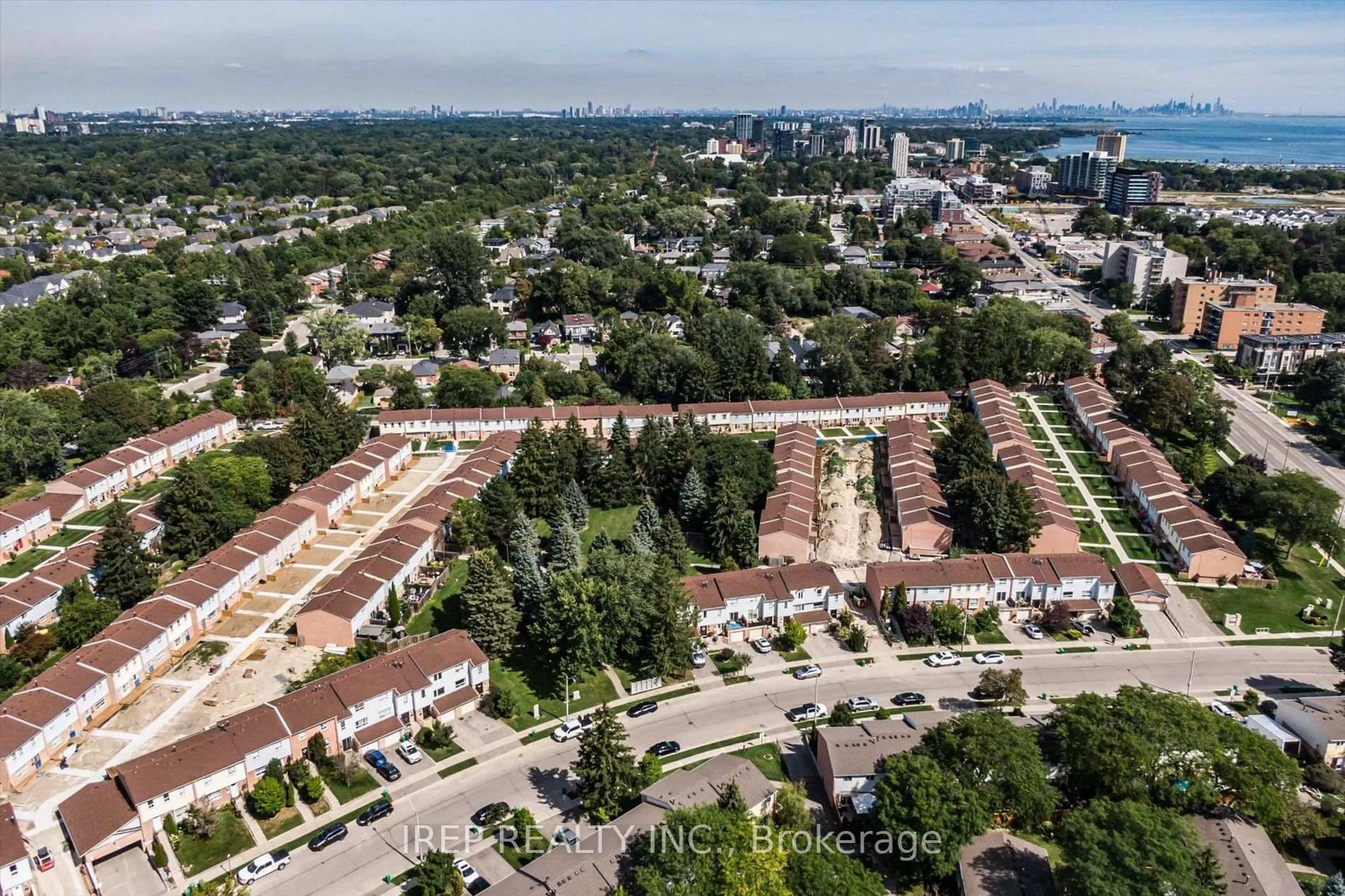 A pic from outside/outdoor area/front of a property/back of a property/a pic from drone, city buildings view from balcony for 1055 Shawnmarr Rd #43, Mississauga Ontario L5H 3V2