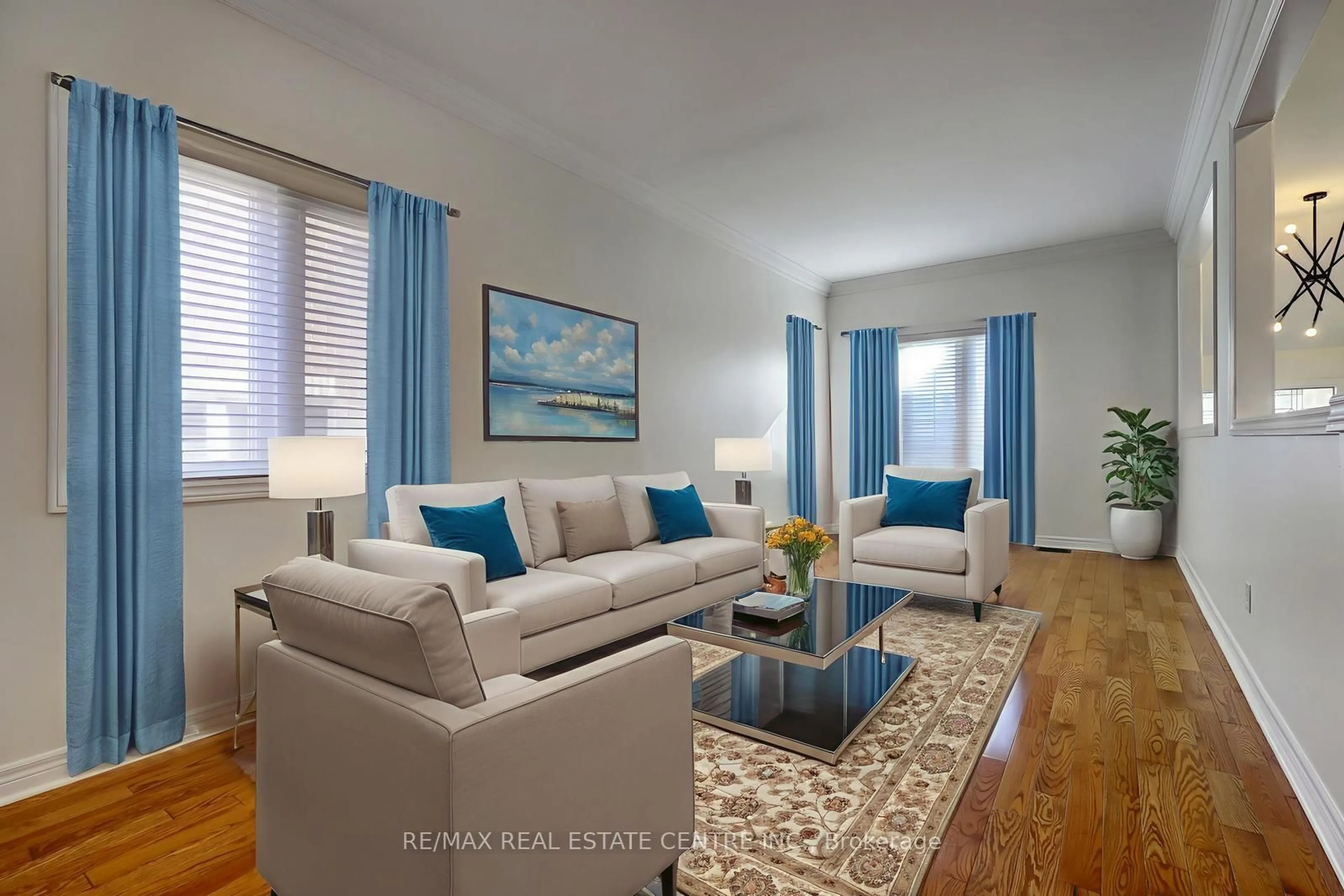 Living room with furniture, wood/laminate floor for 64 Meadowlark Dr, Halton Hills Ontario L7G 6N5