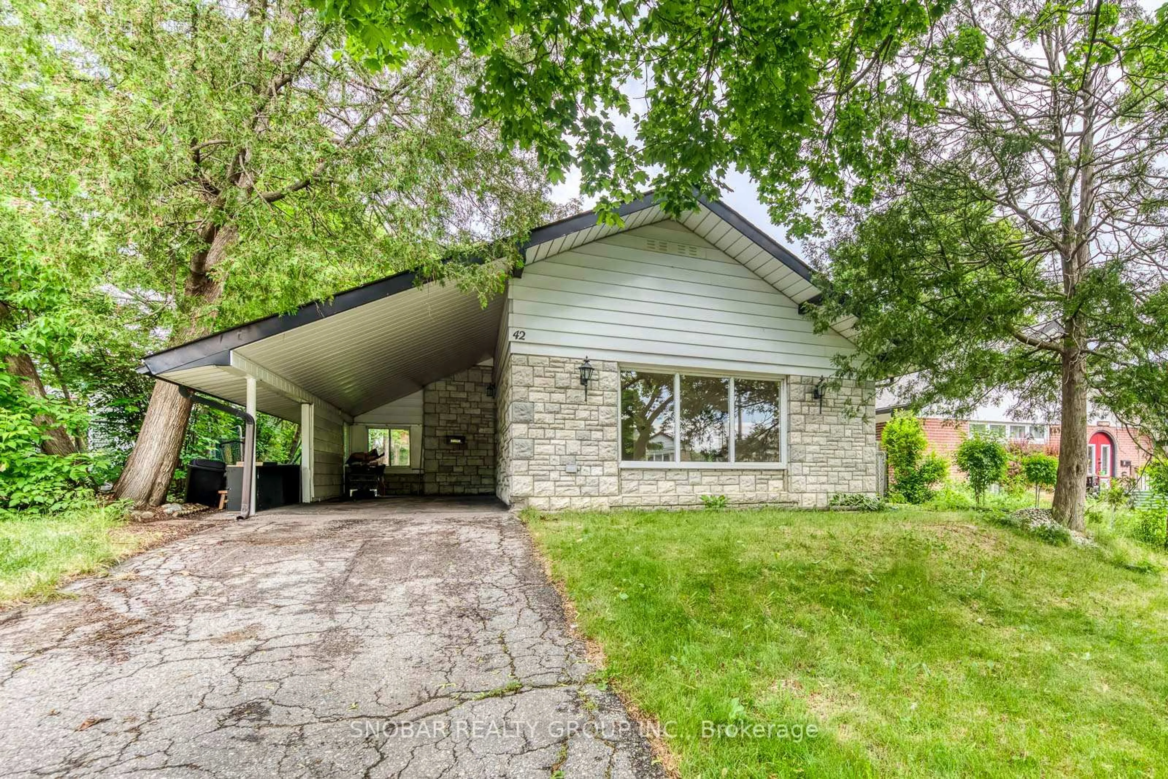 Home with vinyl exterior material, street for 42 Clearbrooke Circ, Toronto Ontario M9W 2E4