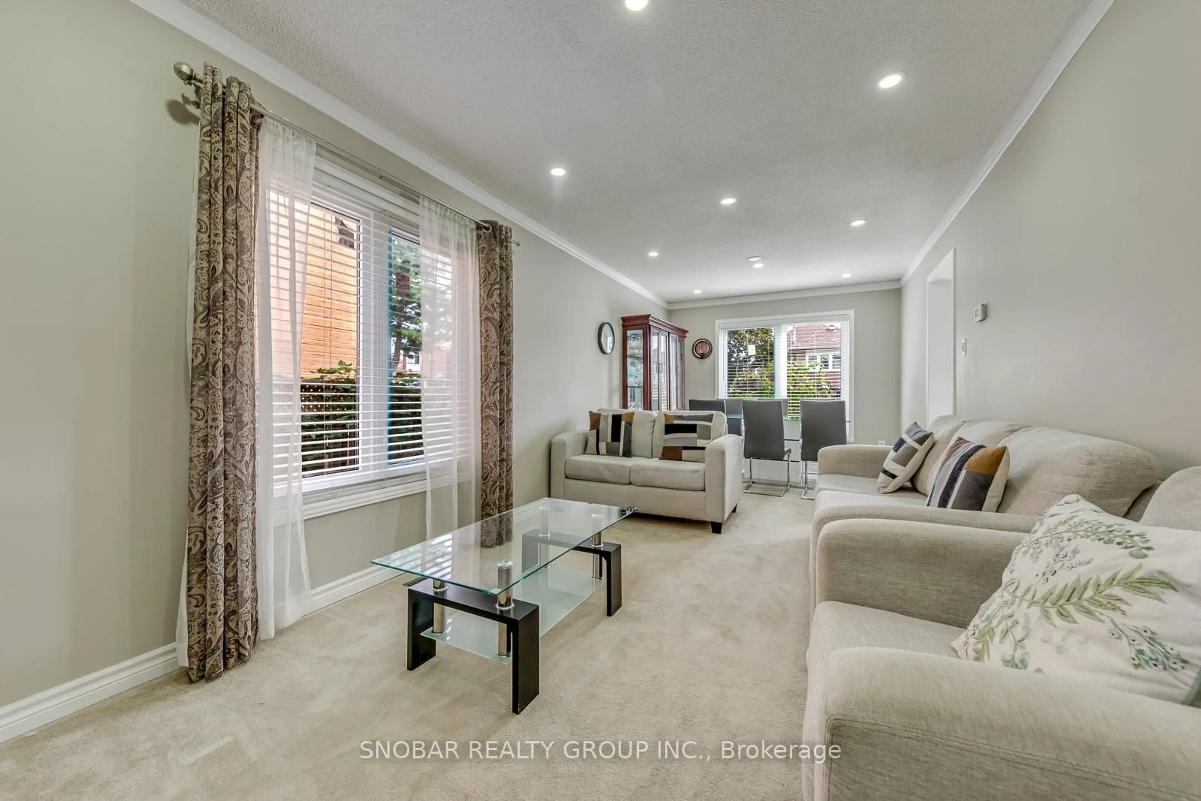 Living room with furniture, ceramic/tile floor for 99 Bighorn Cres, Brampton Ontario L6R 1G2