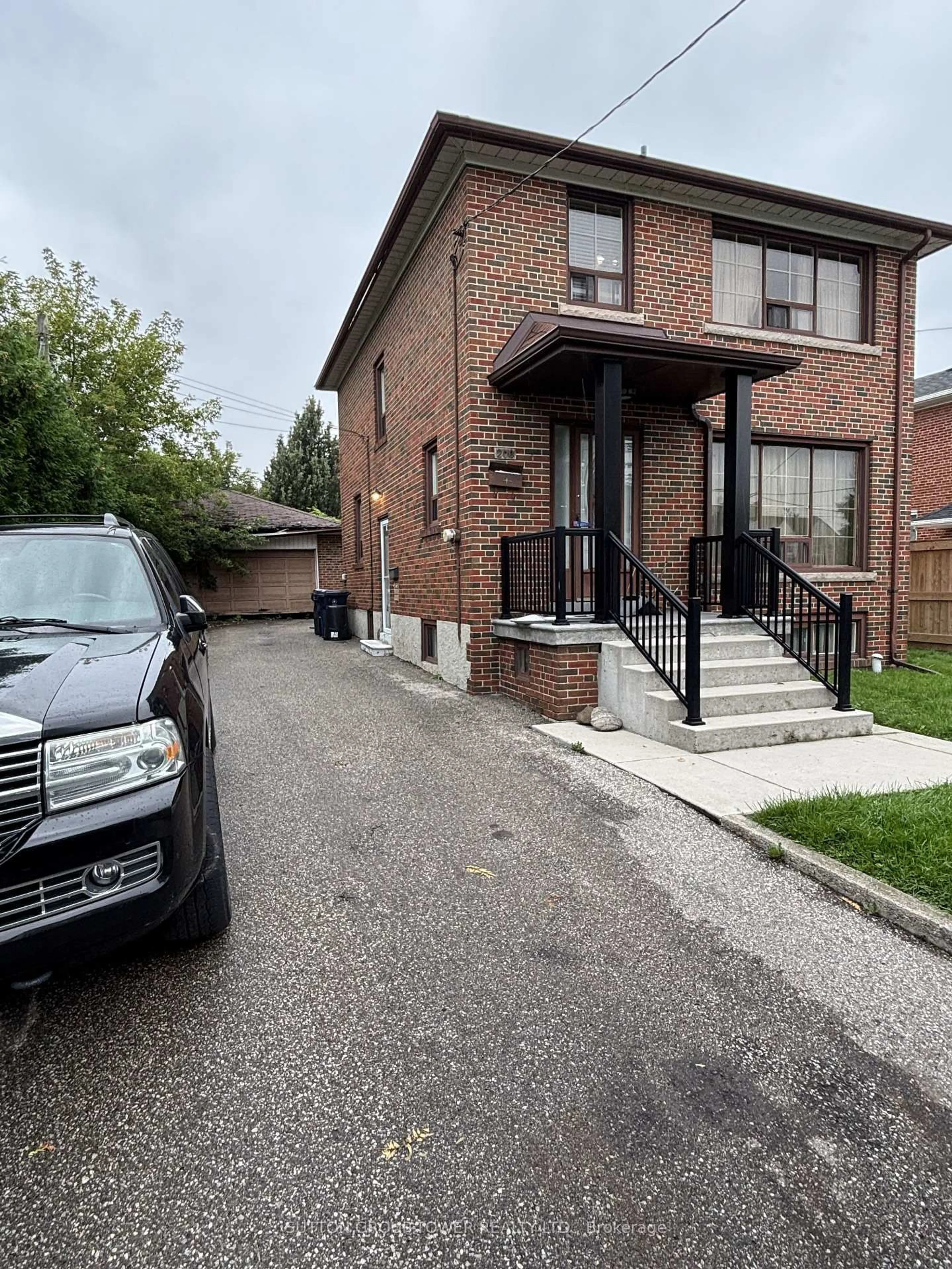 Home with brick exterior material, street for 200 Locksley Ave, Toronto Ontario M6B 3N9
