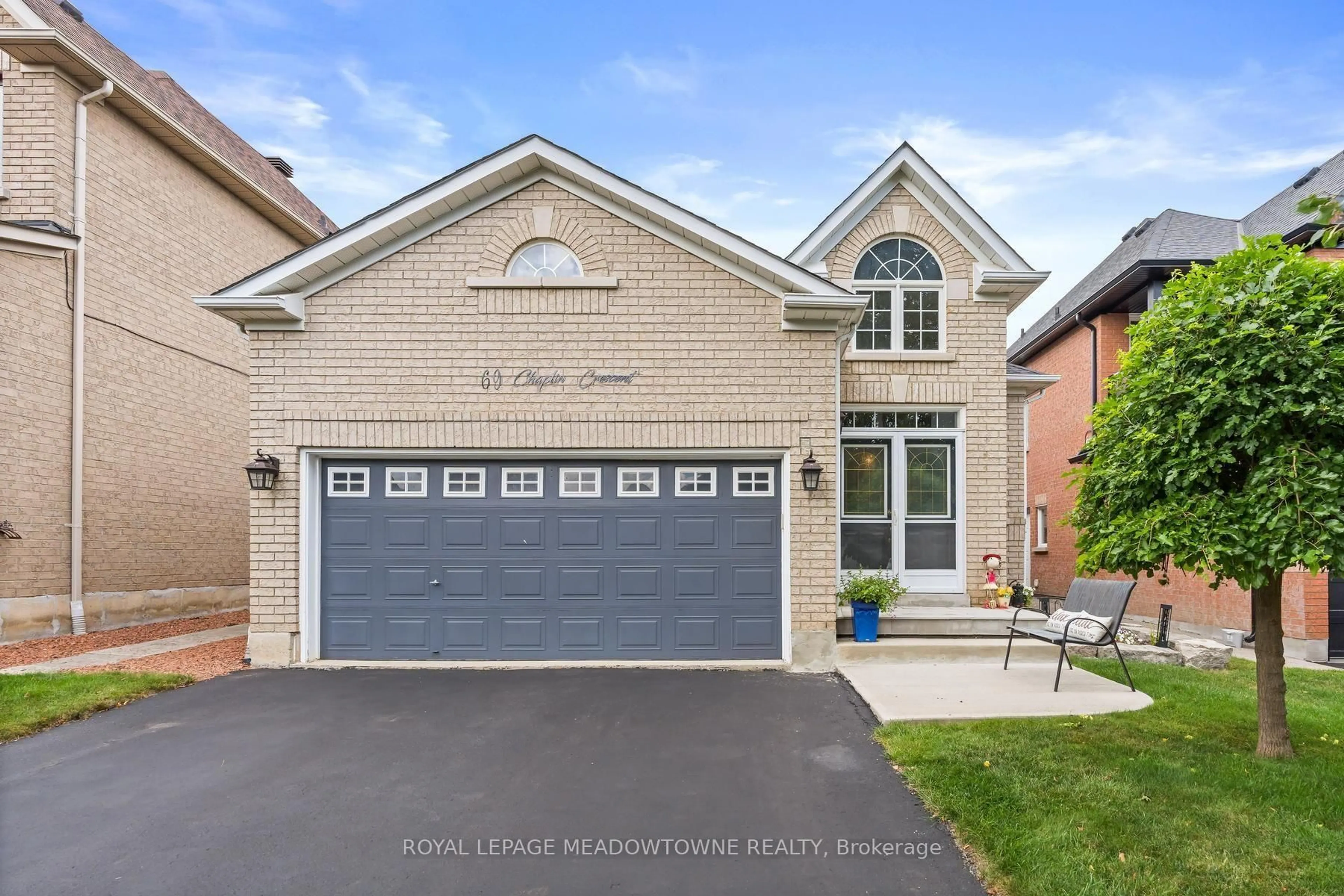 Home with brick exterior material, street for 69 Chaplin Cres, Halton Hills Ontario L7G 5V6