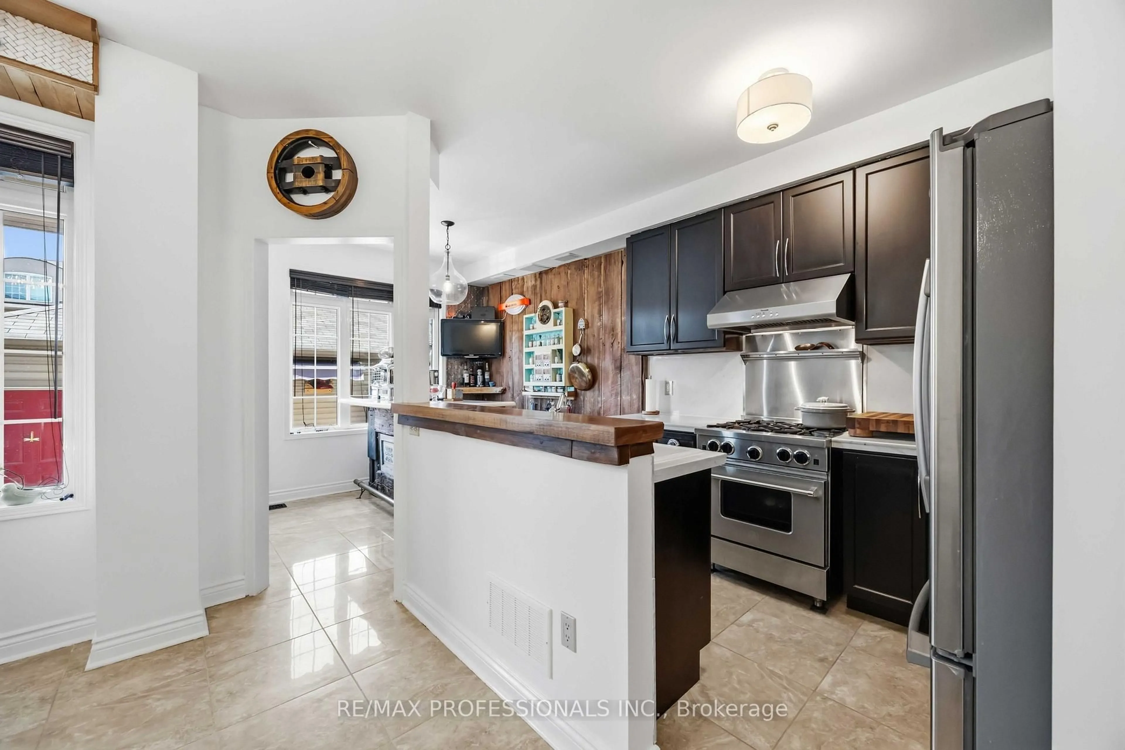 Open concept kitchen, unknown for 26 Abraham Welsh Rd, Toronto Ontario M9M 0B7