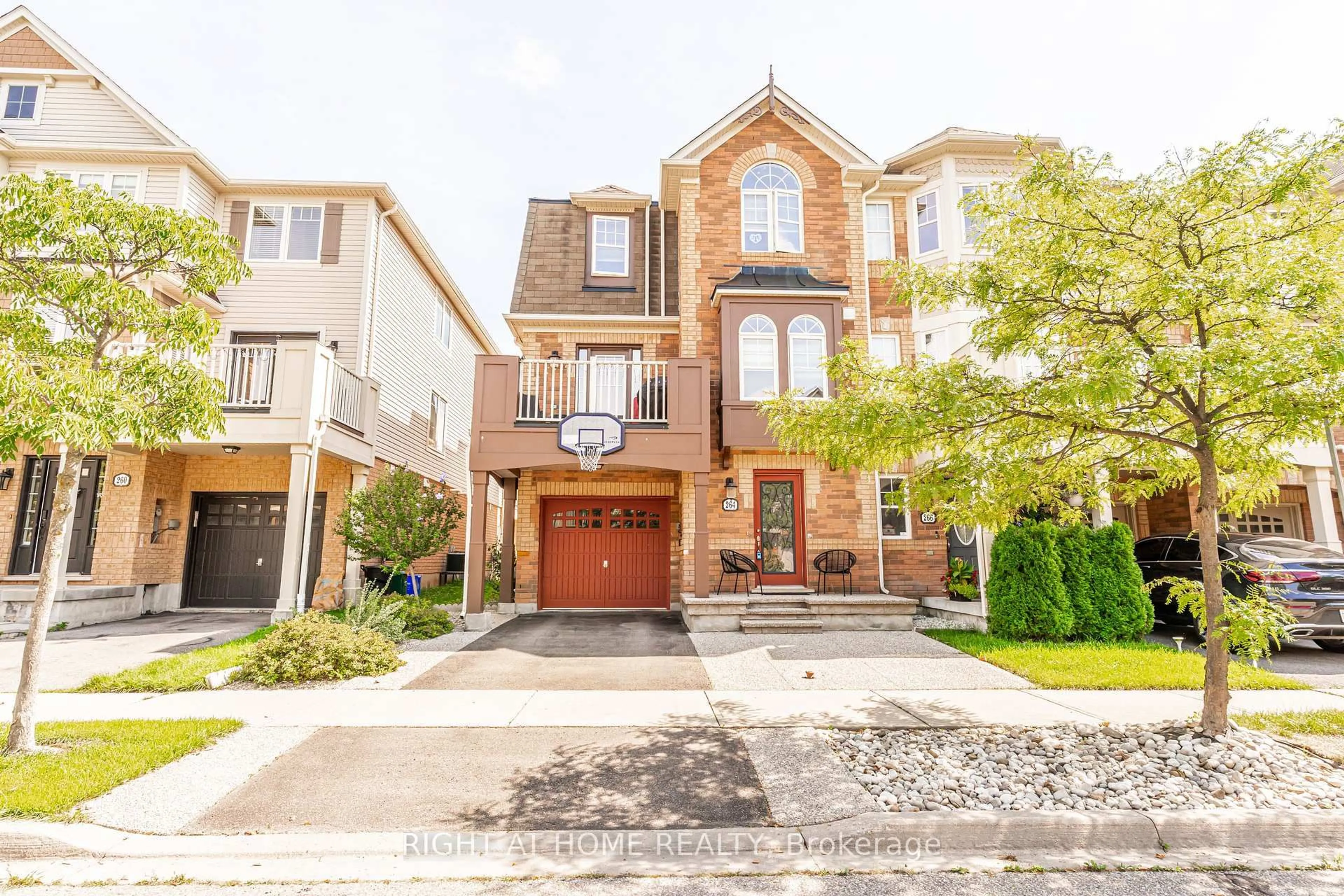 Home with brick exterior material, street for 264 Wetenhall Landing, Milton Ontario L9T 7B7