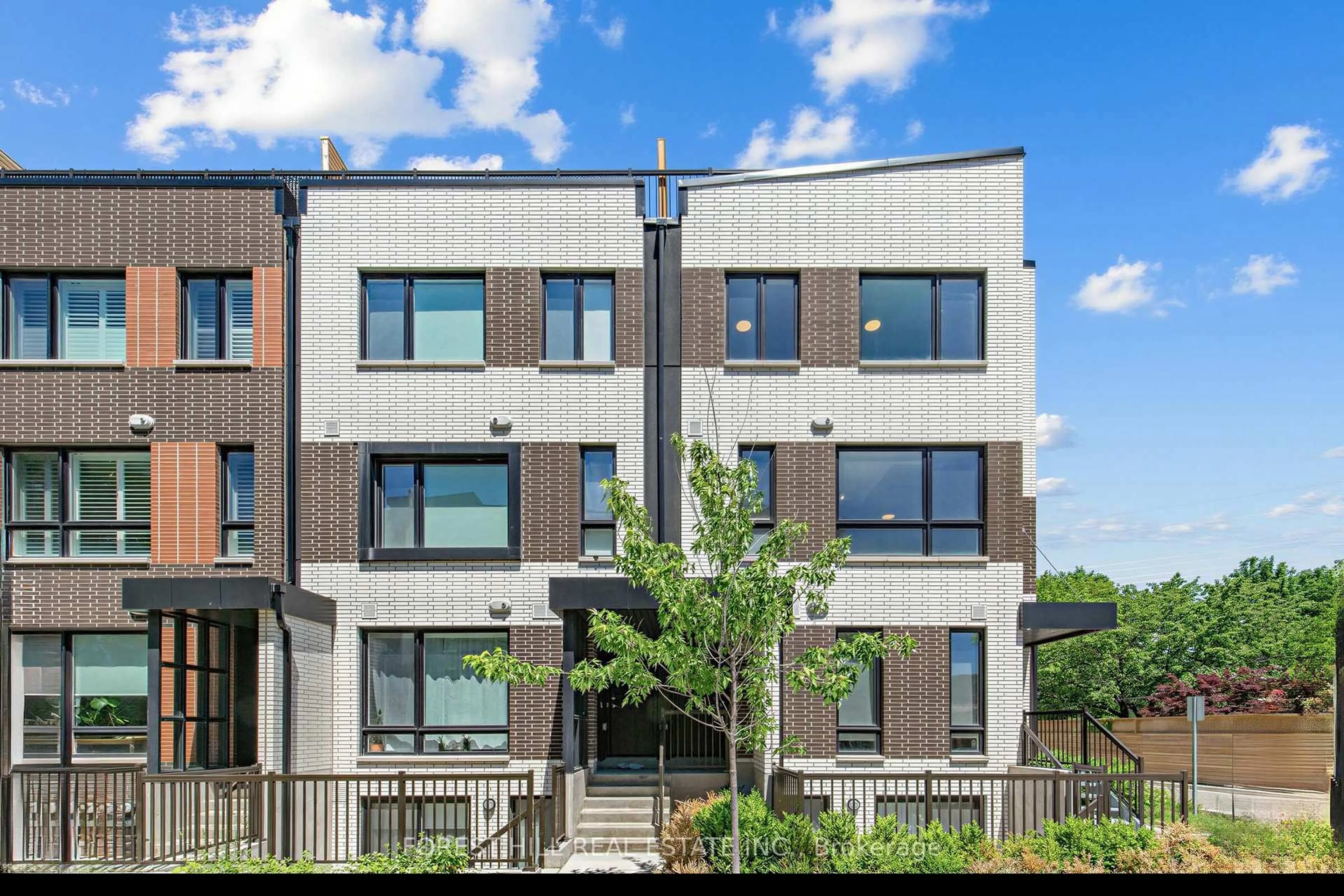 Home with brick exterior material, unknown for 40 Ed Clark Gdns #2, Toronto Ontario M6N 0B5