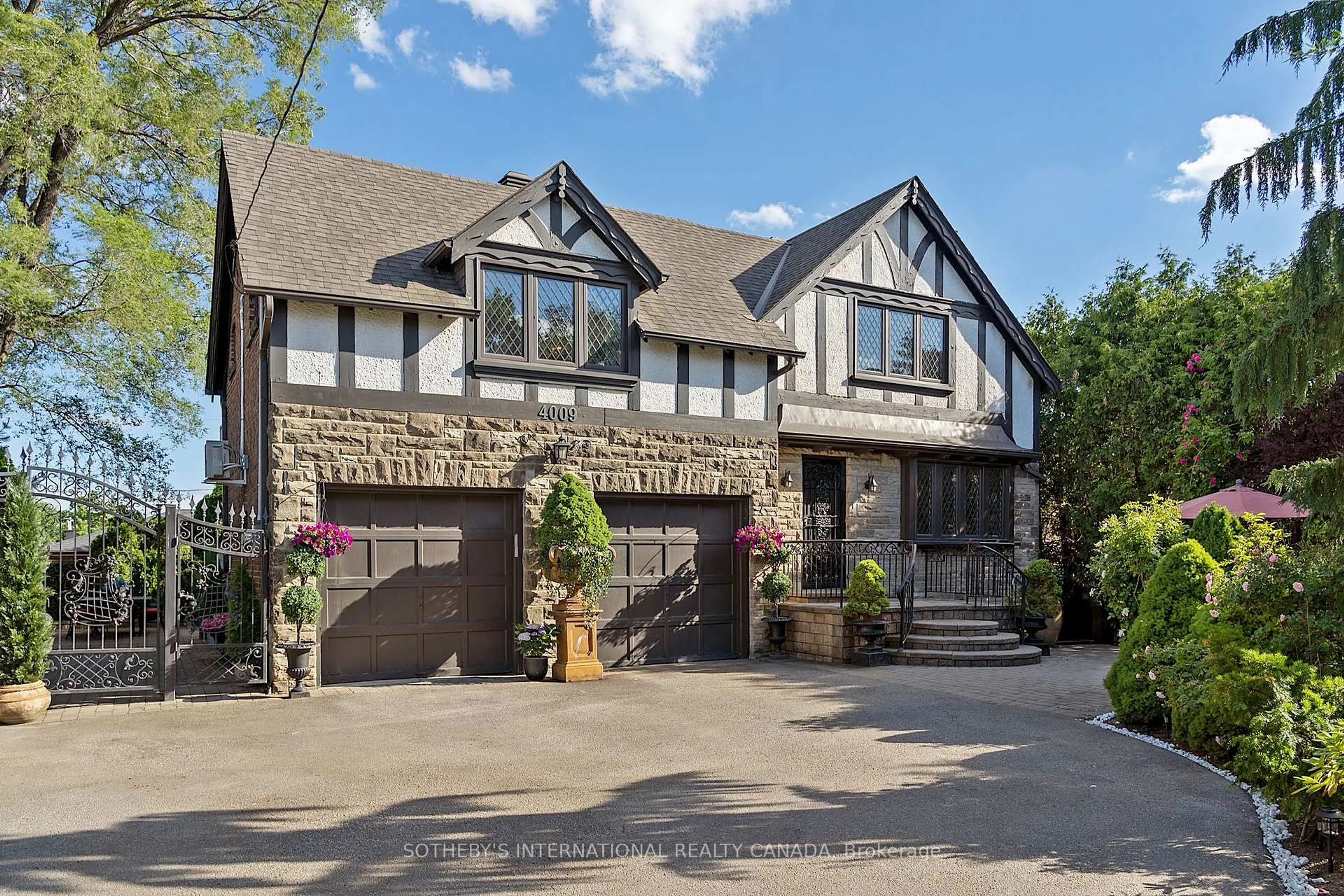 Home with brick exterior material, street for 4009 Bloor St, Toronto Ontario M9B 1M4
